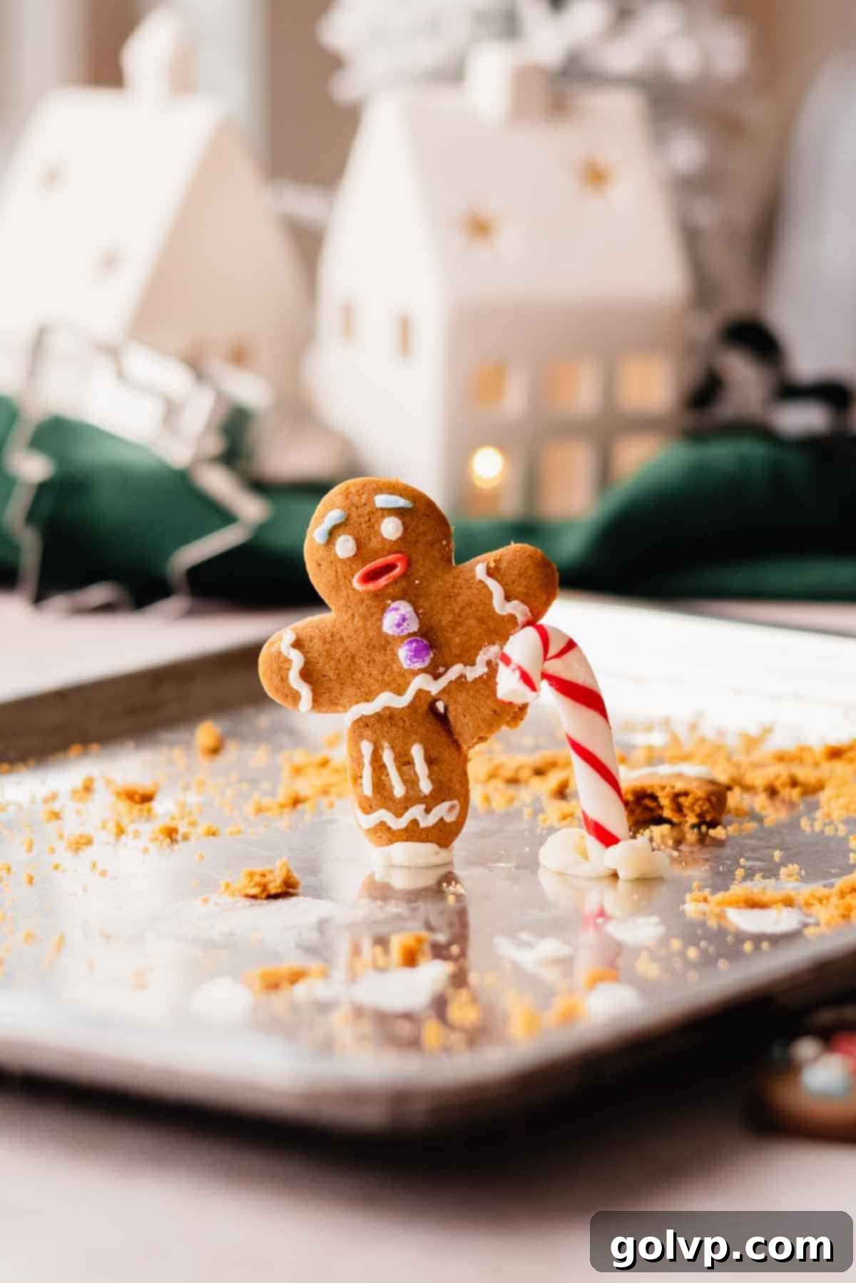 Gingy the Shrek gingerbread man standing with one leg, using a candy cane as a crutch, replicating a movie scene