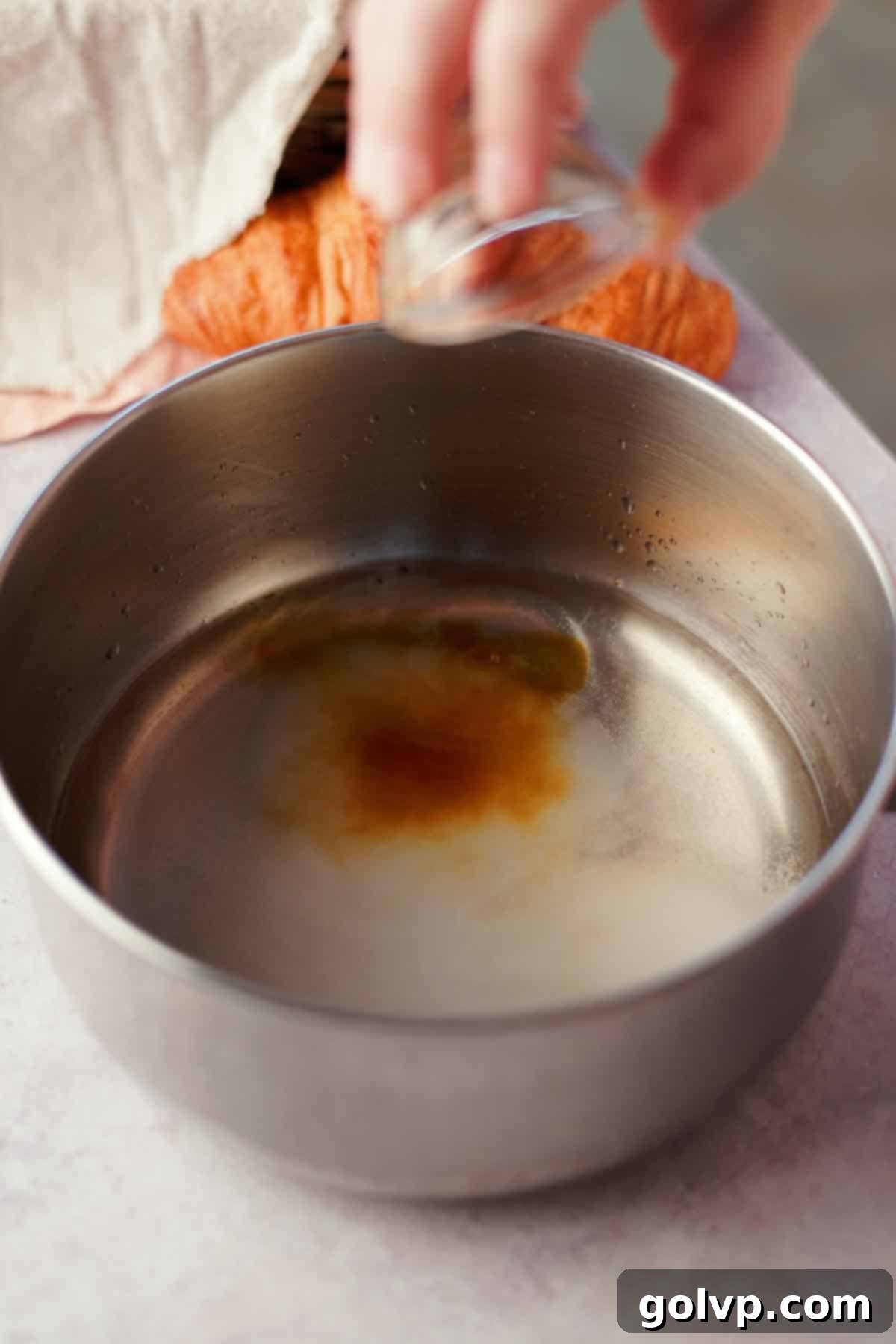 making soaking syrup to rehydrate croissants