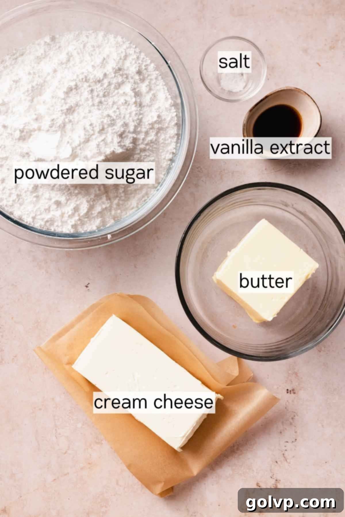 ingredients for cream cheese frosting in bowls