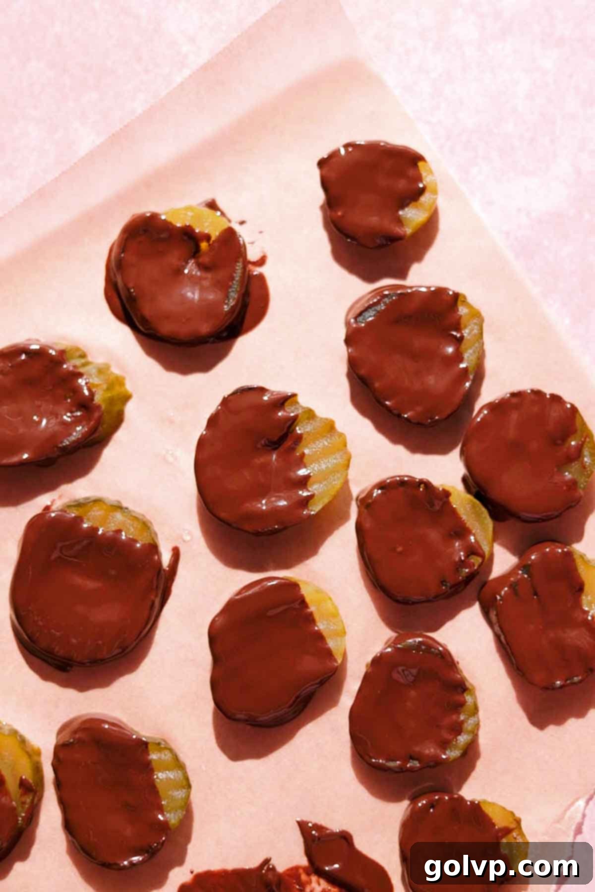 pickles dipped in melted chocolate placed on parchment paper to set