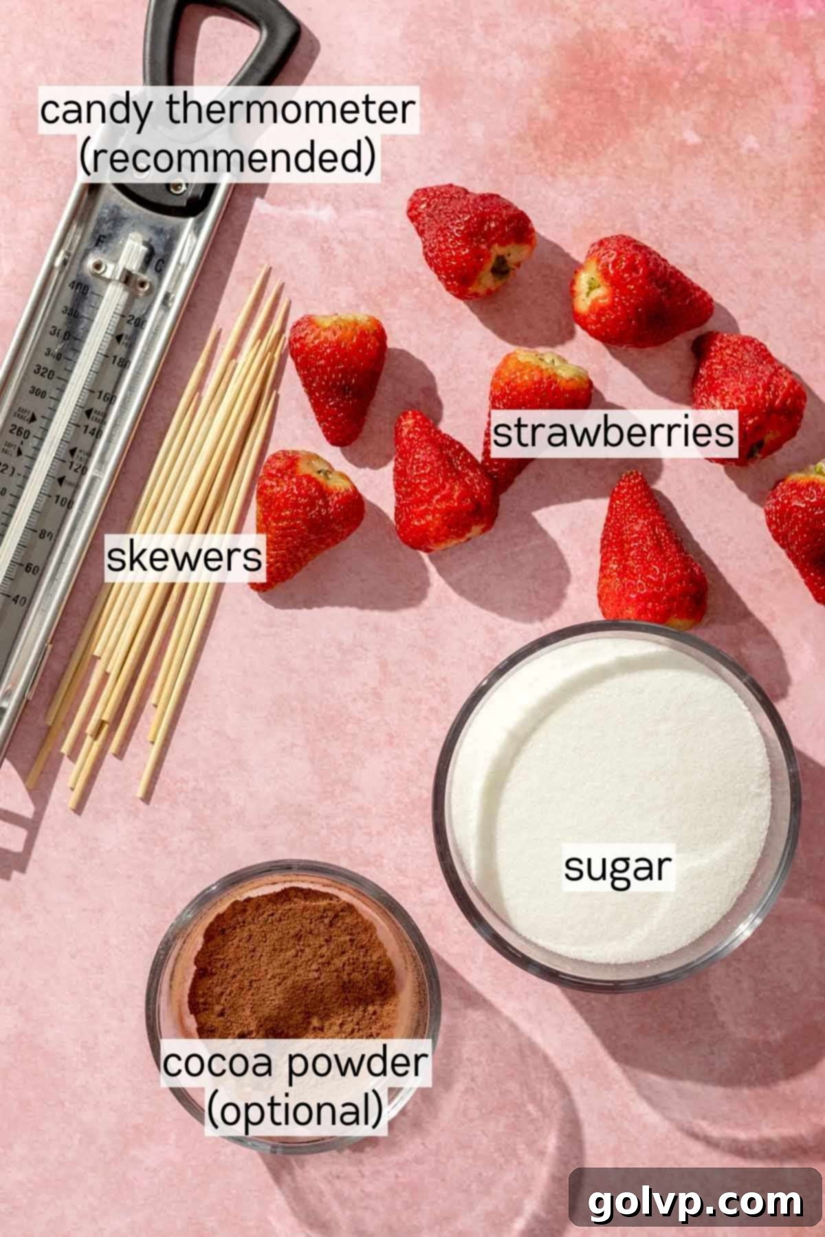 Bowls of fresh strawberries, granulated sugar, and cocoa powder, the key ingredients for Tanghulu