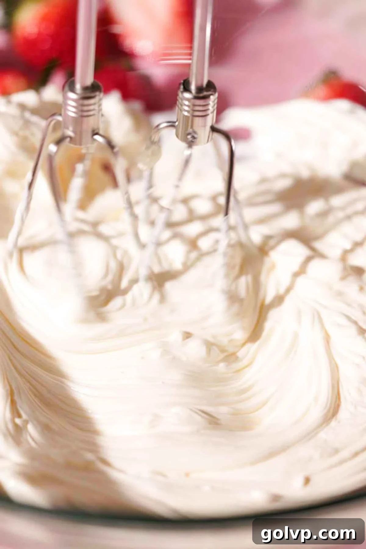 beating mascarpone cheese until smooth with electric mixer