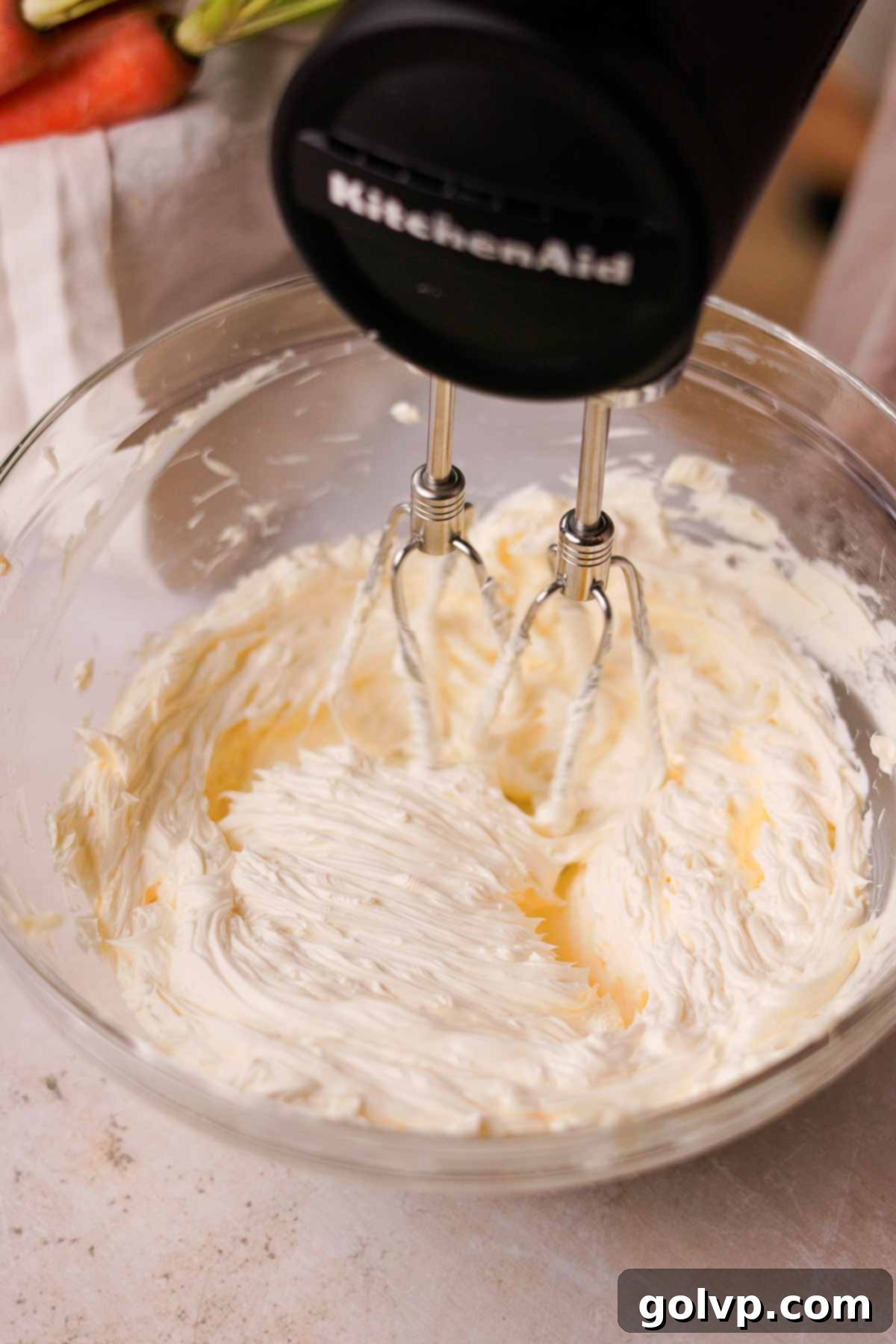 beating butter in a large glass bowl until light and creamy