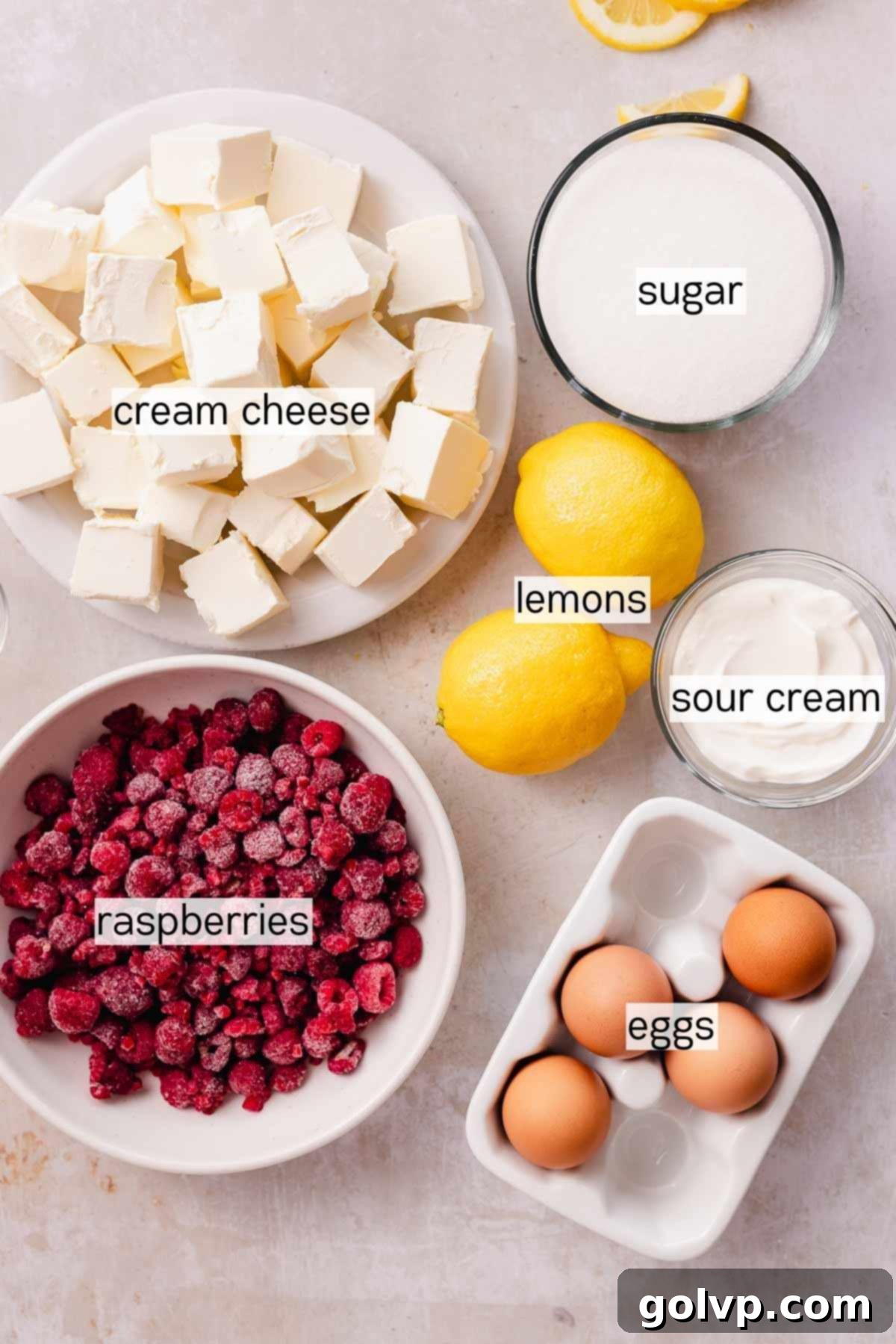 lemon raspberry cheesecake batter ingredients in bowls