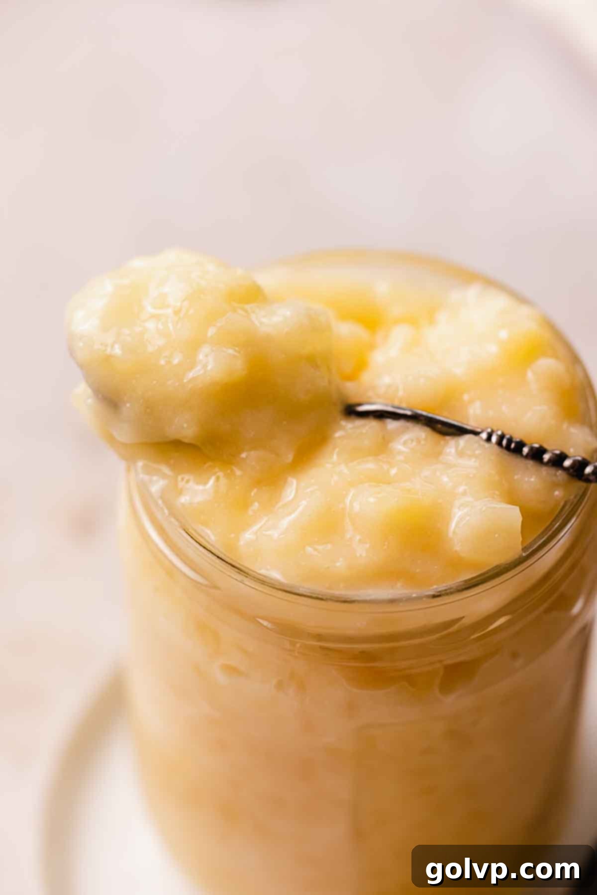 close up of pineapple filling in a jar
