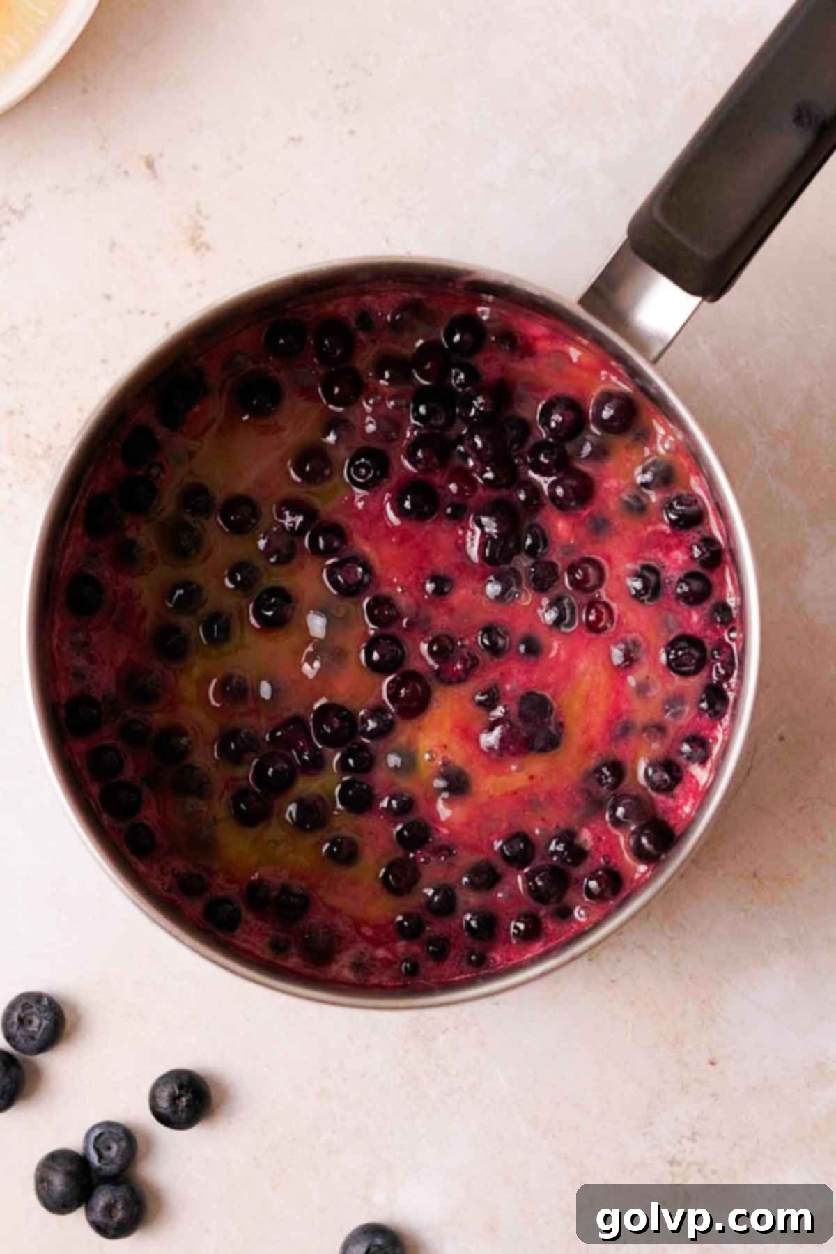 uncooked blueberry curd in saucepan