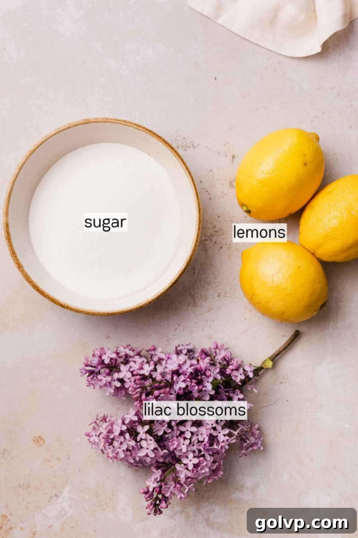 ingredients for lilac lemonade in bowls