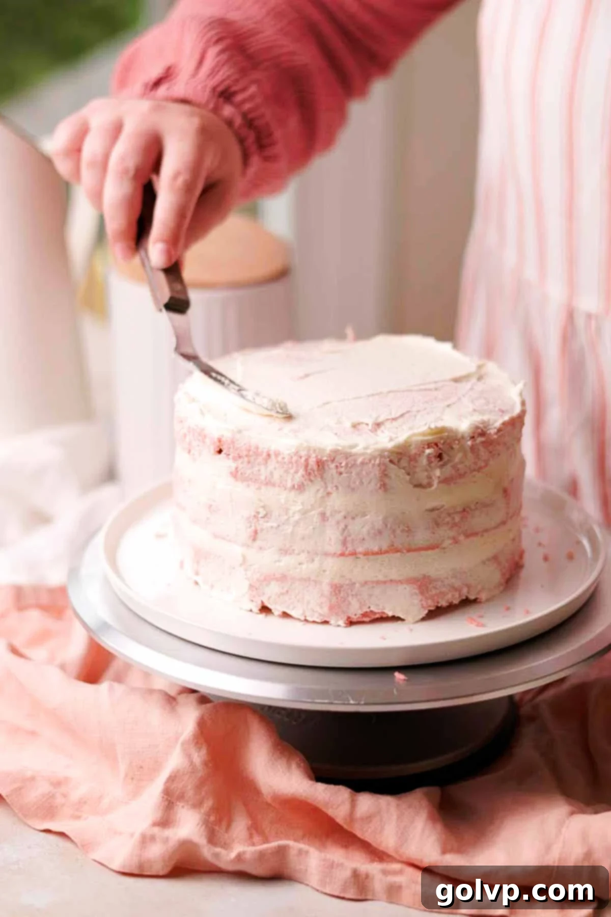 covering cake with crumb coat