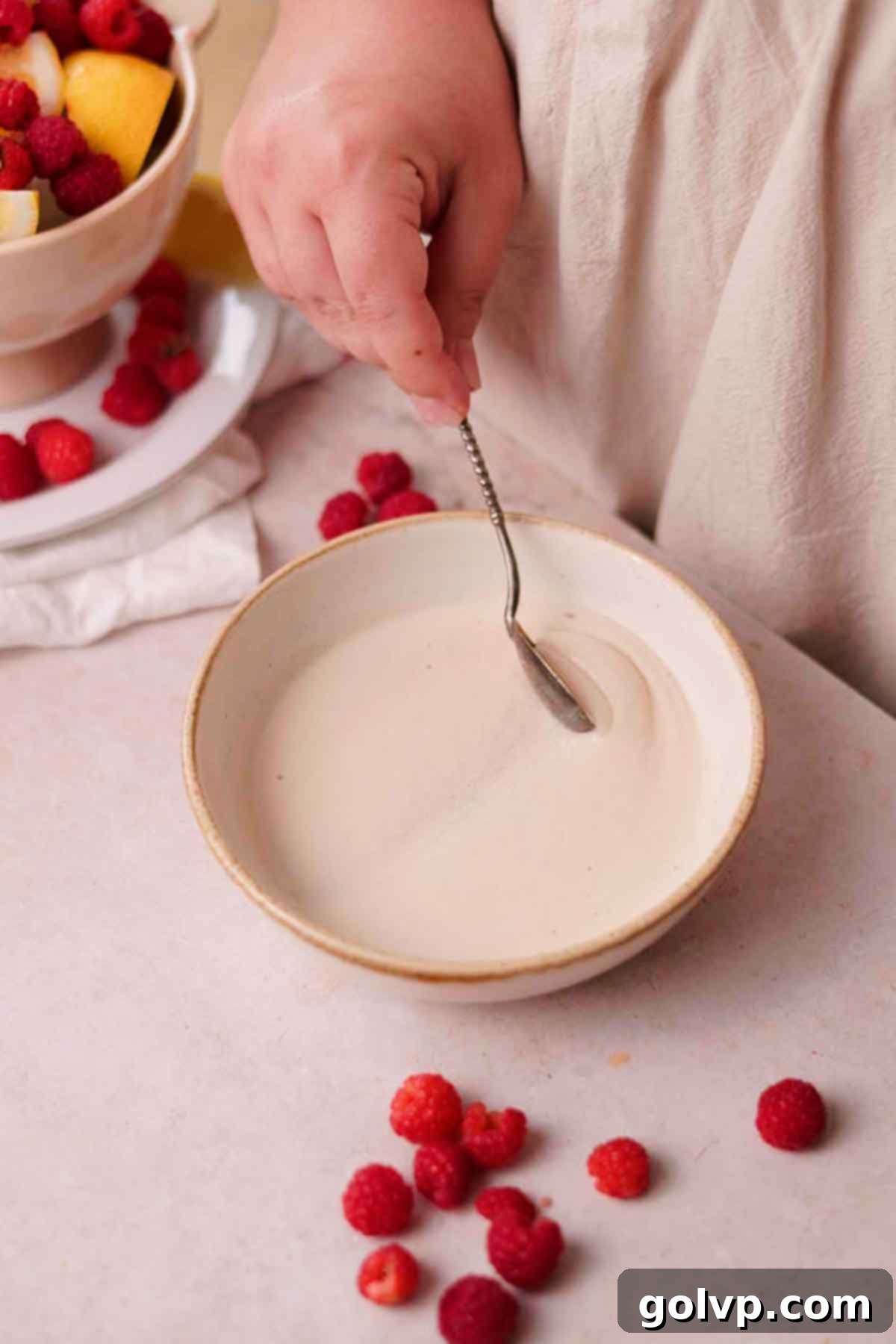bloomed yeast with thick foam on top in a bowl