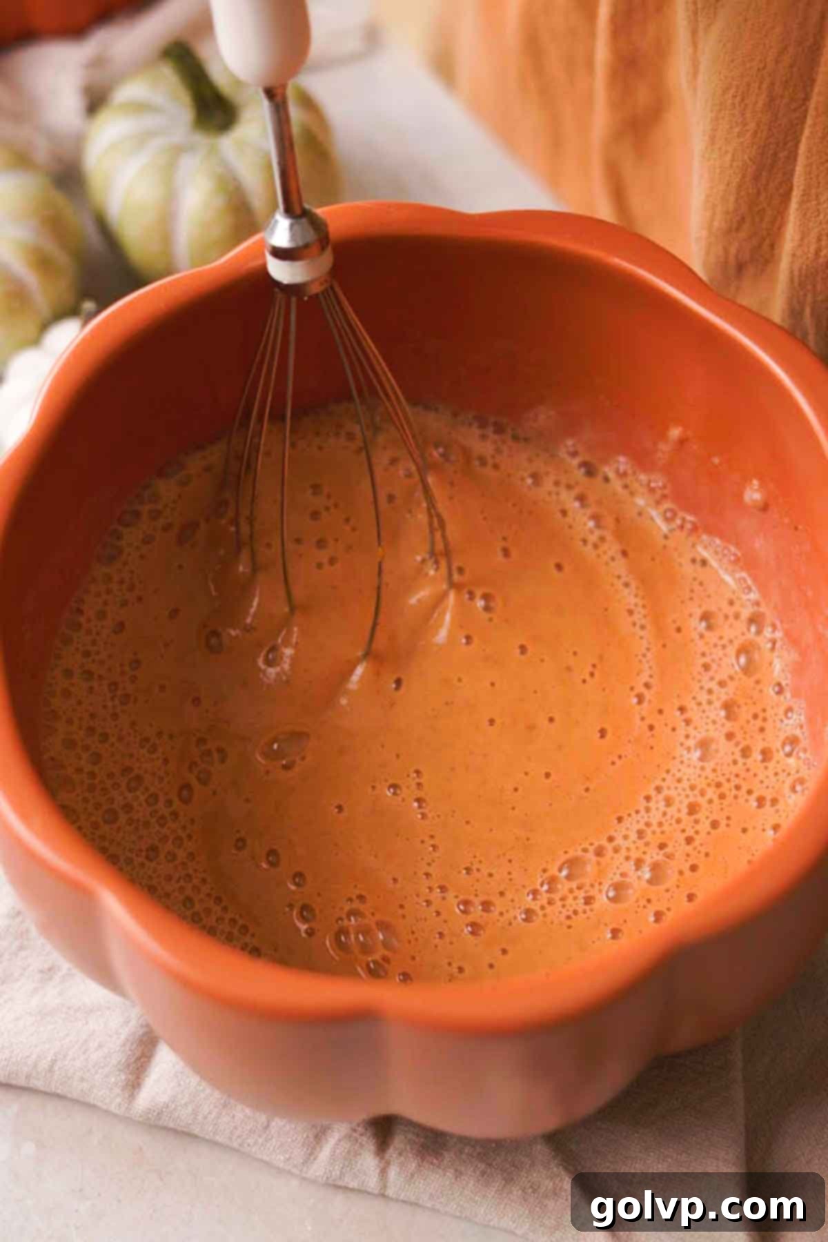 Step 1: Whisking wet ingredients for pumpkin pancake batter