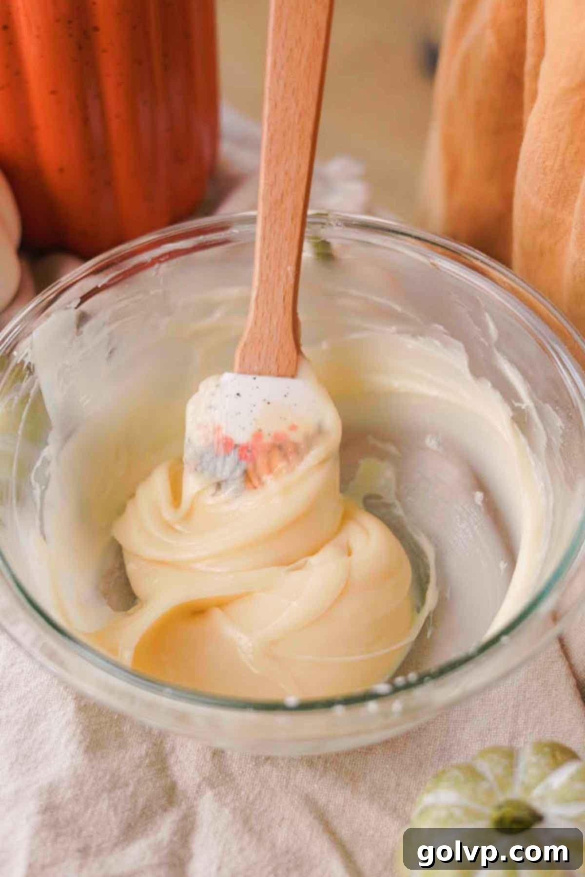 Step 1: Mashing cream cheese and powdered sugar for glaze