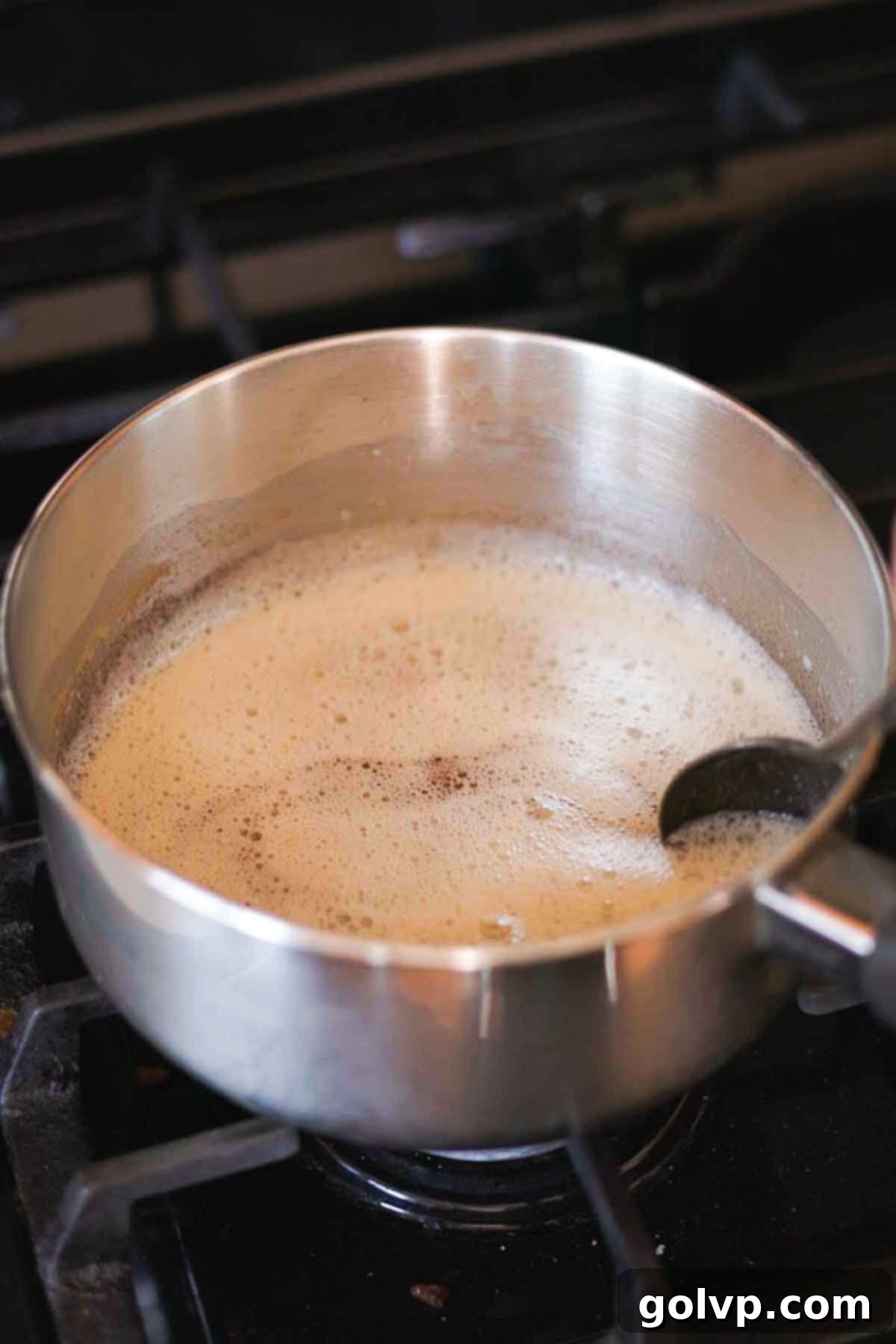 browning butter on top of a stovetop in a saucepan