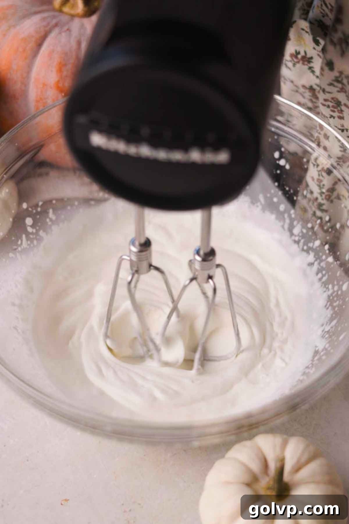whipping heavy cream in a chilled bowl