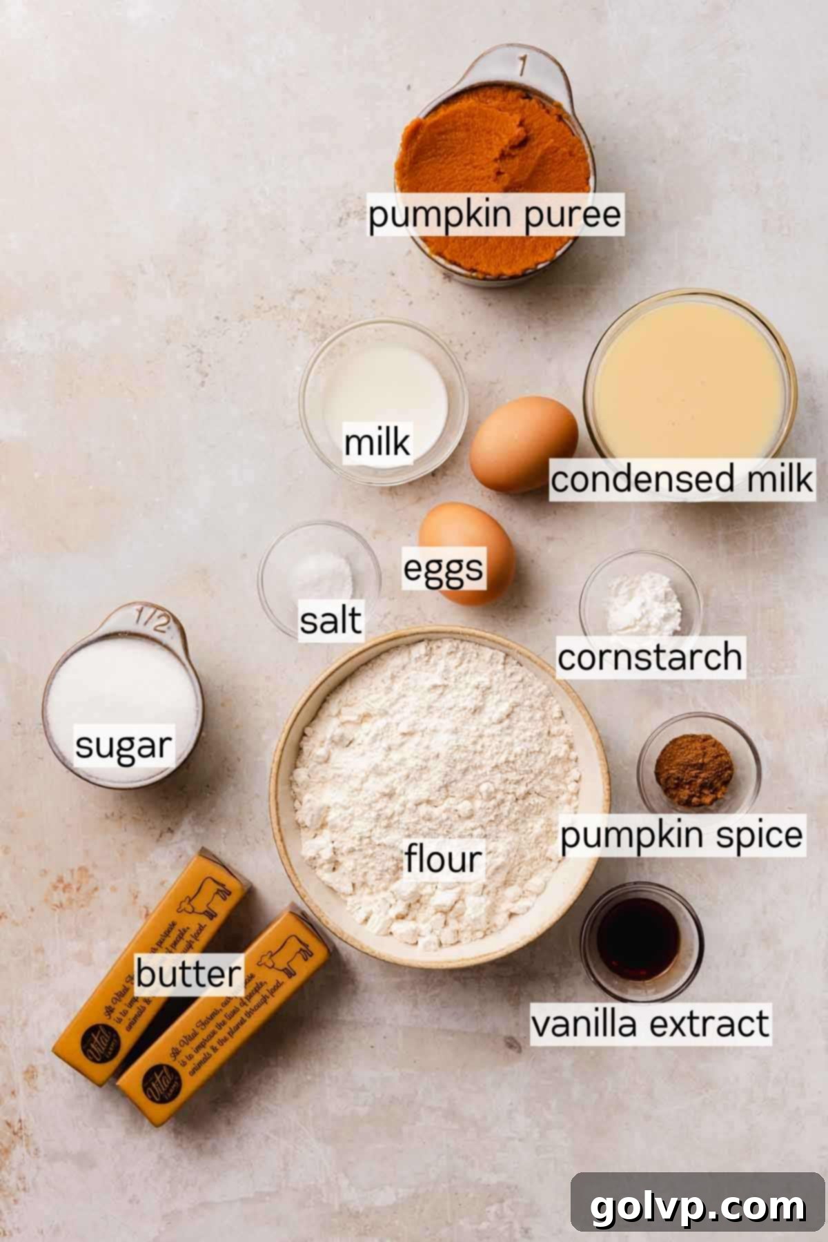Ingredients for pumpkin pie bars measured out and labeled