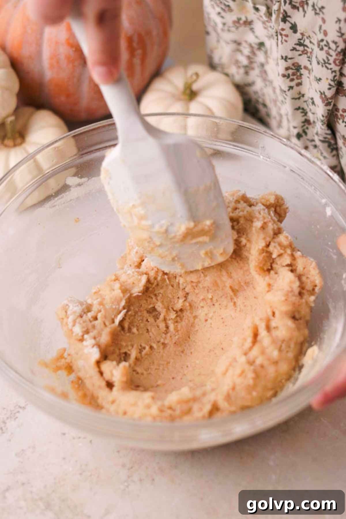 mixing crust dough with flour