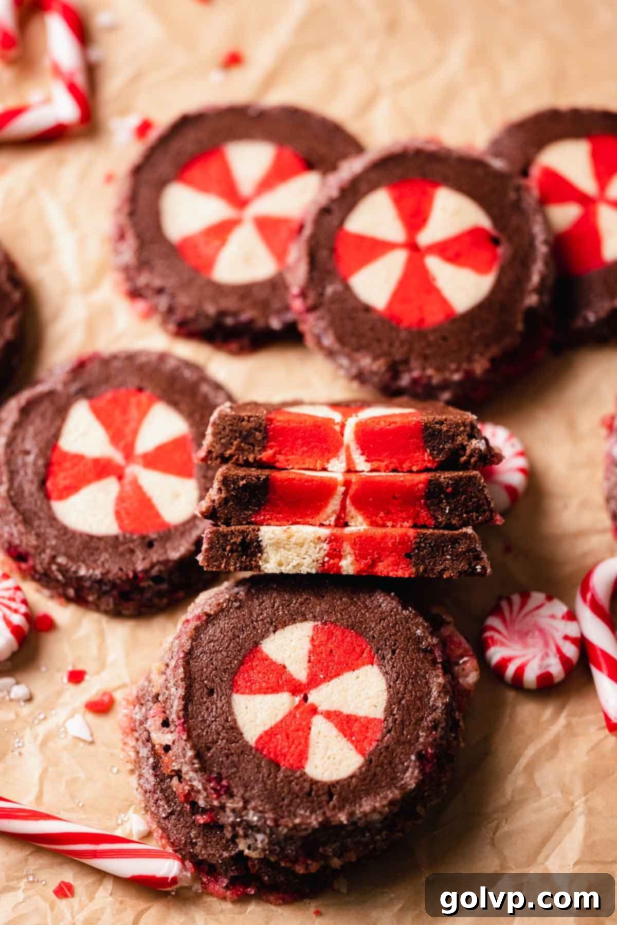 peppermint chocolate sugar cookies cut in half to show the inside pattern