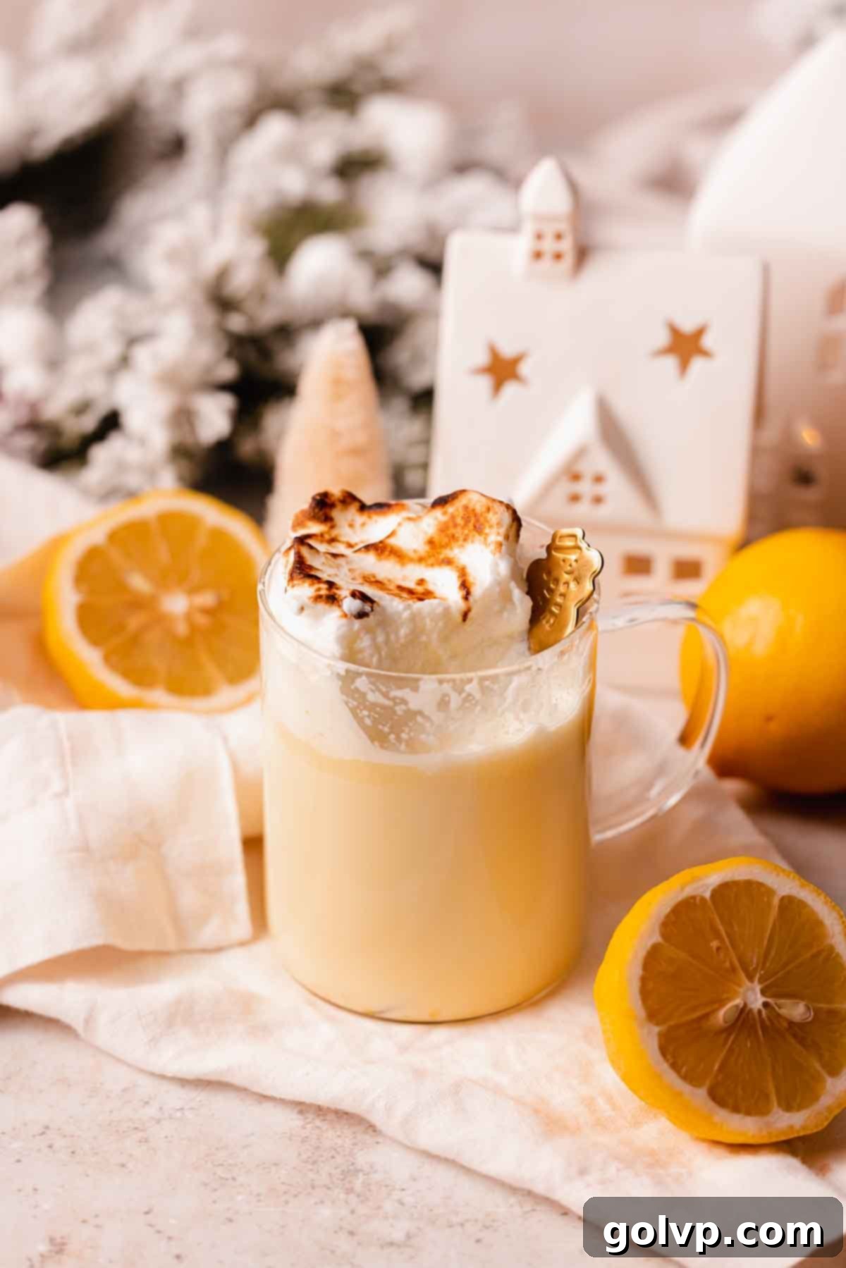 Zesty Meringue White Hot Cocoa Dream 10 lemon hot chocolate in mug with snowman spoon