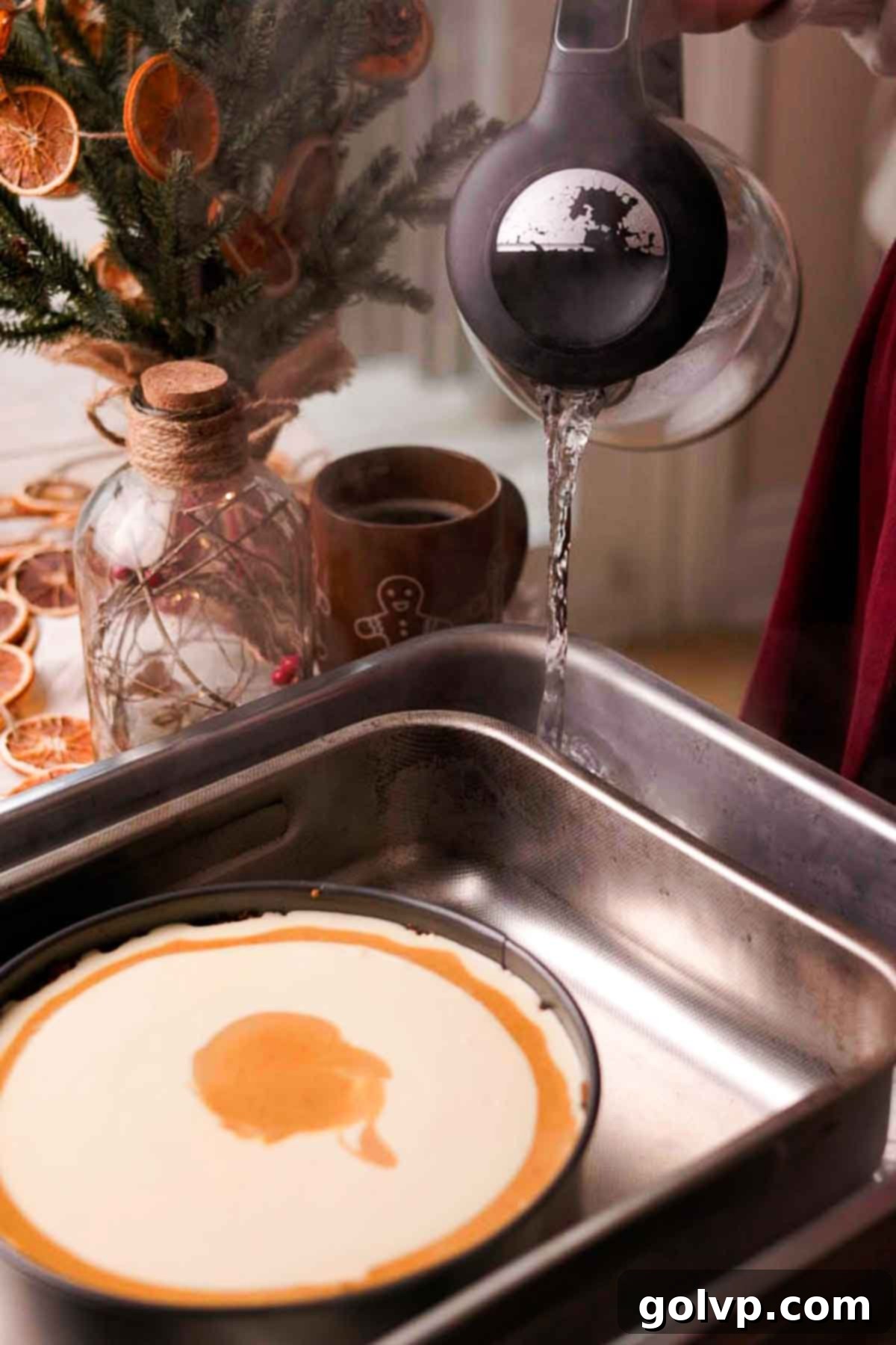 prepping water bath for gingerbread cheesecake