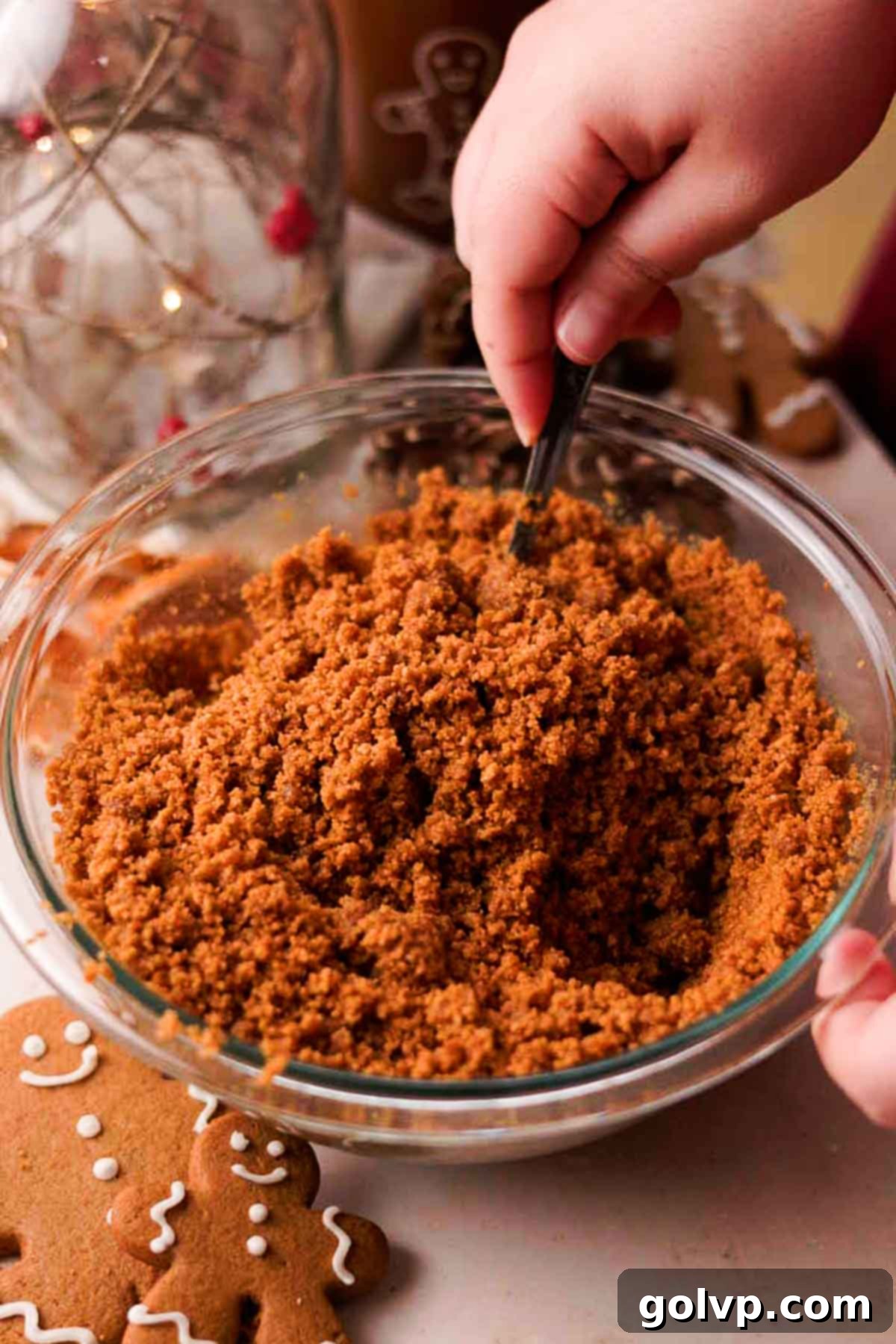 mixing together the gingerbread crust