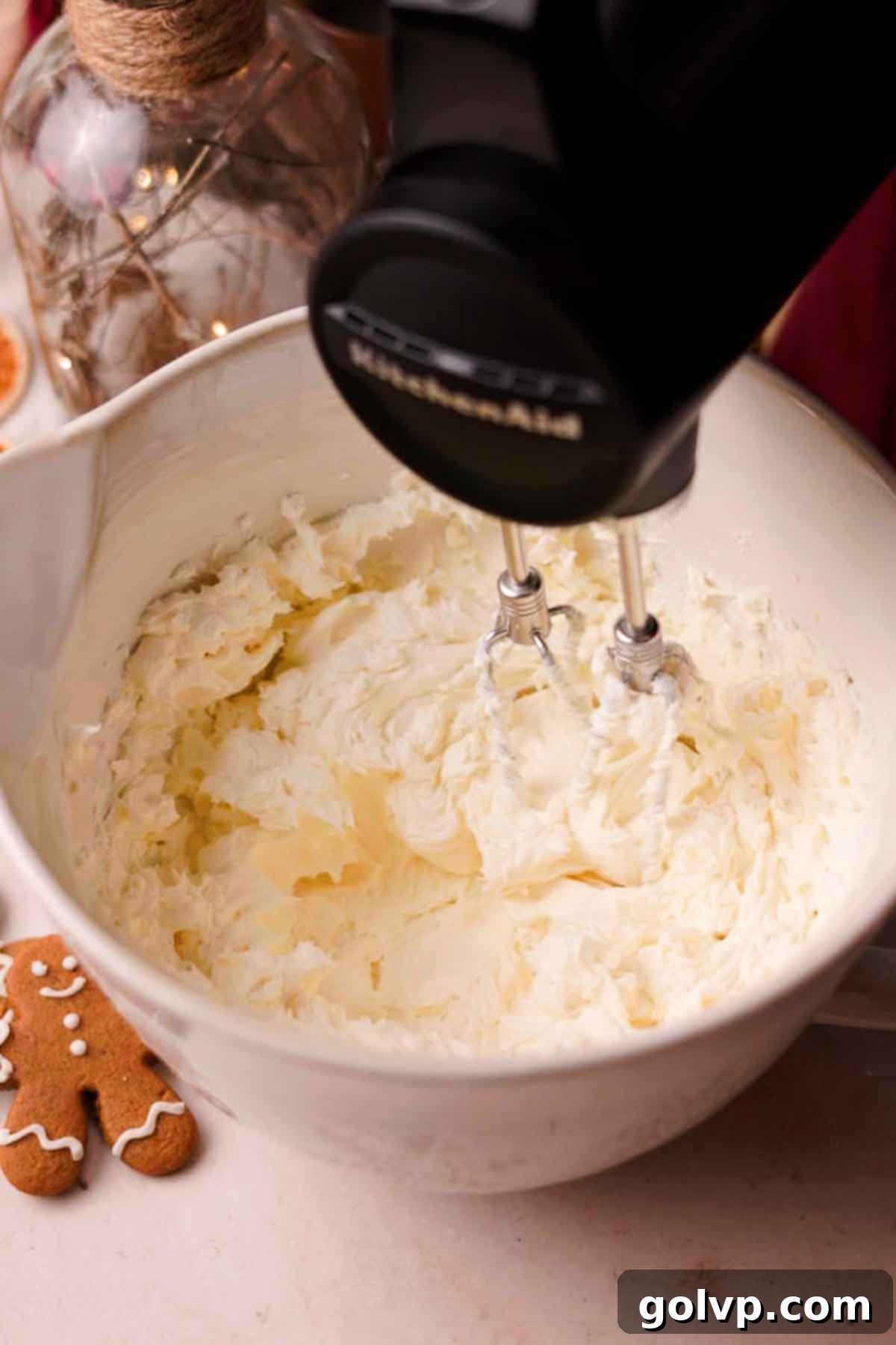 blending cream cheese until creamy