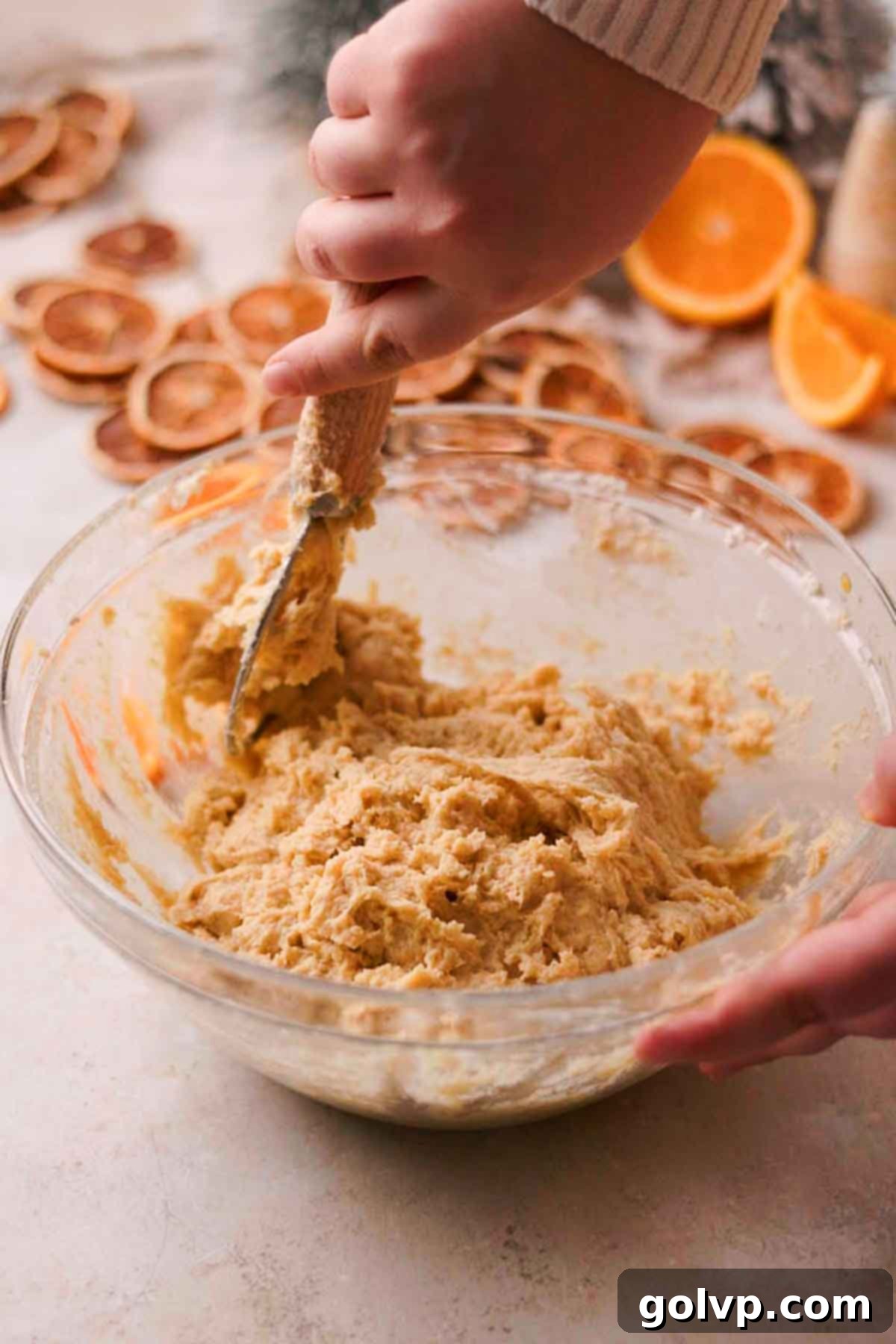 mixing orange cardamom dough