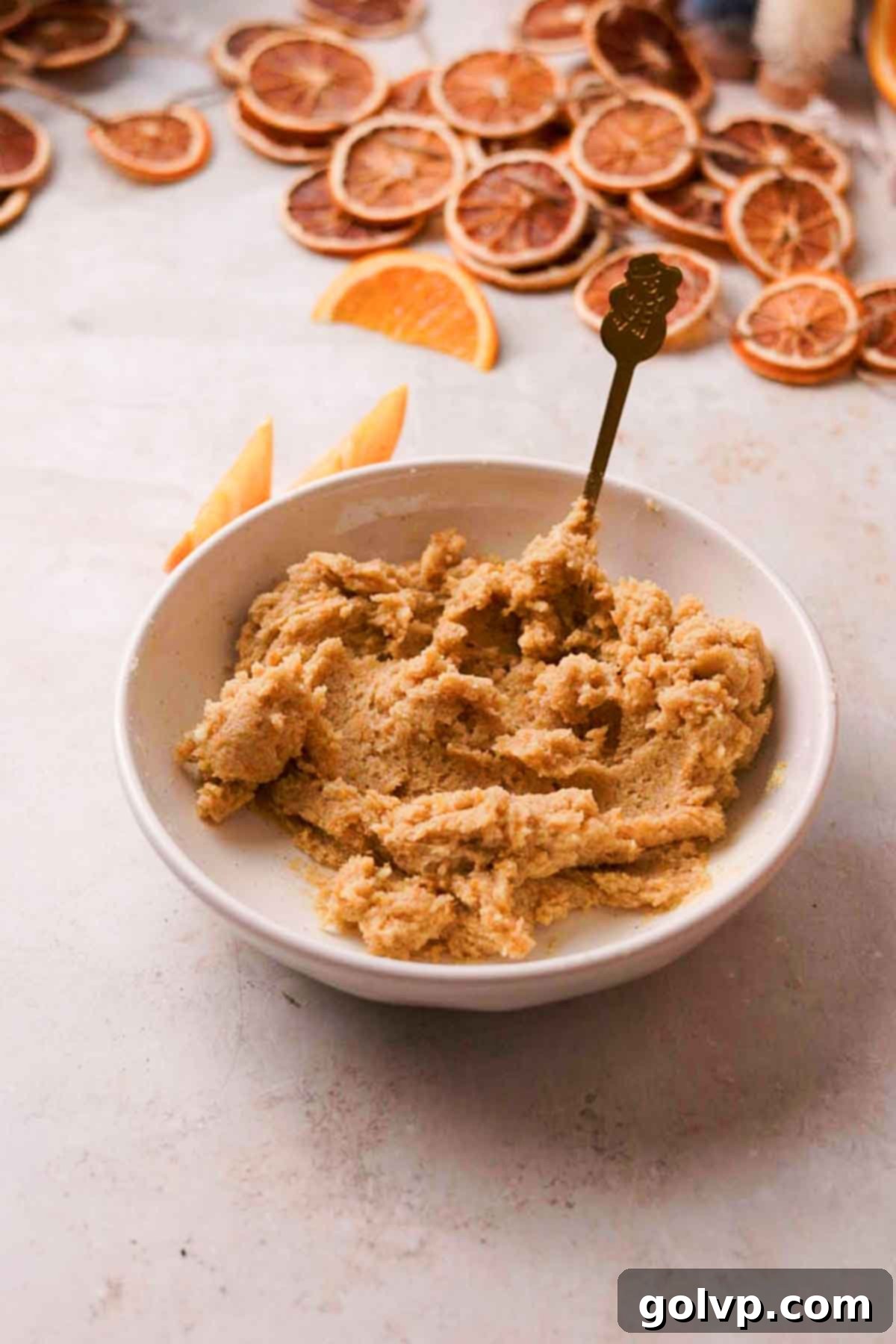 mixing orange vanilla filling for rolls