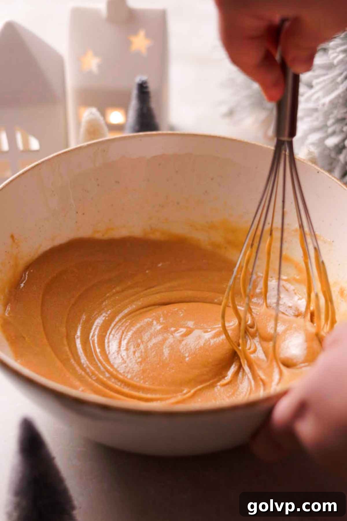 adding melted butter to the cookie dough
