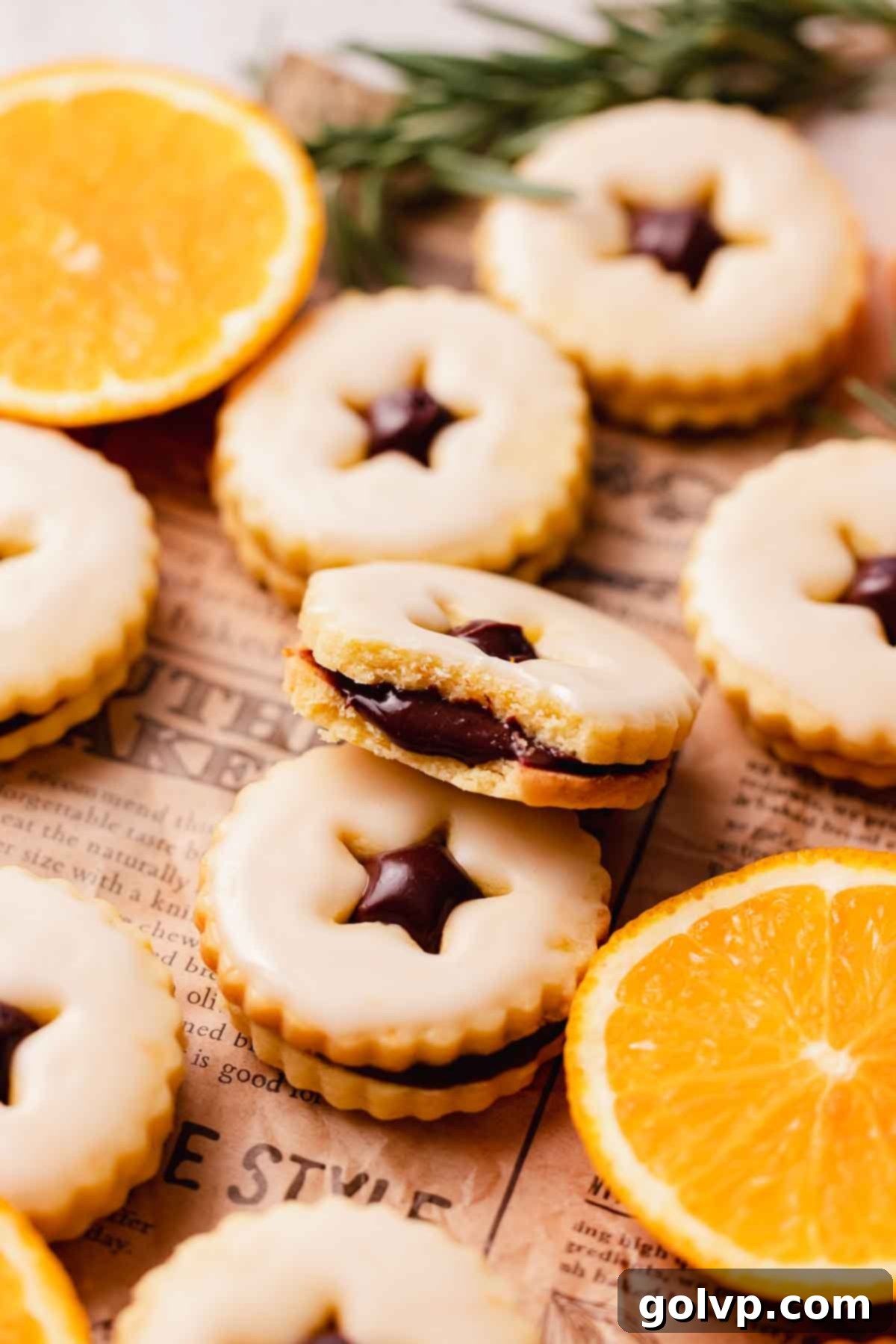 bitten chocolate orange shortbread cookie, revealing the creamy chocolate filling