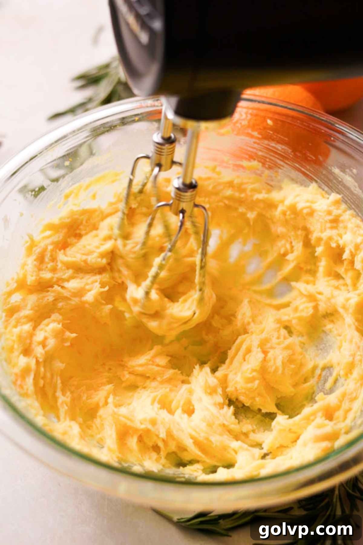 beat butter and orange sugar mixture together until light and creamy