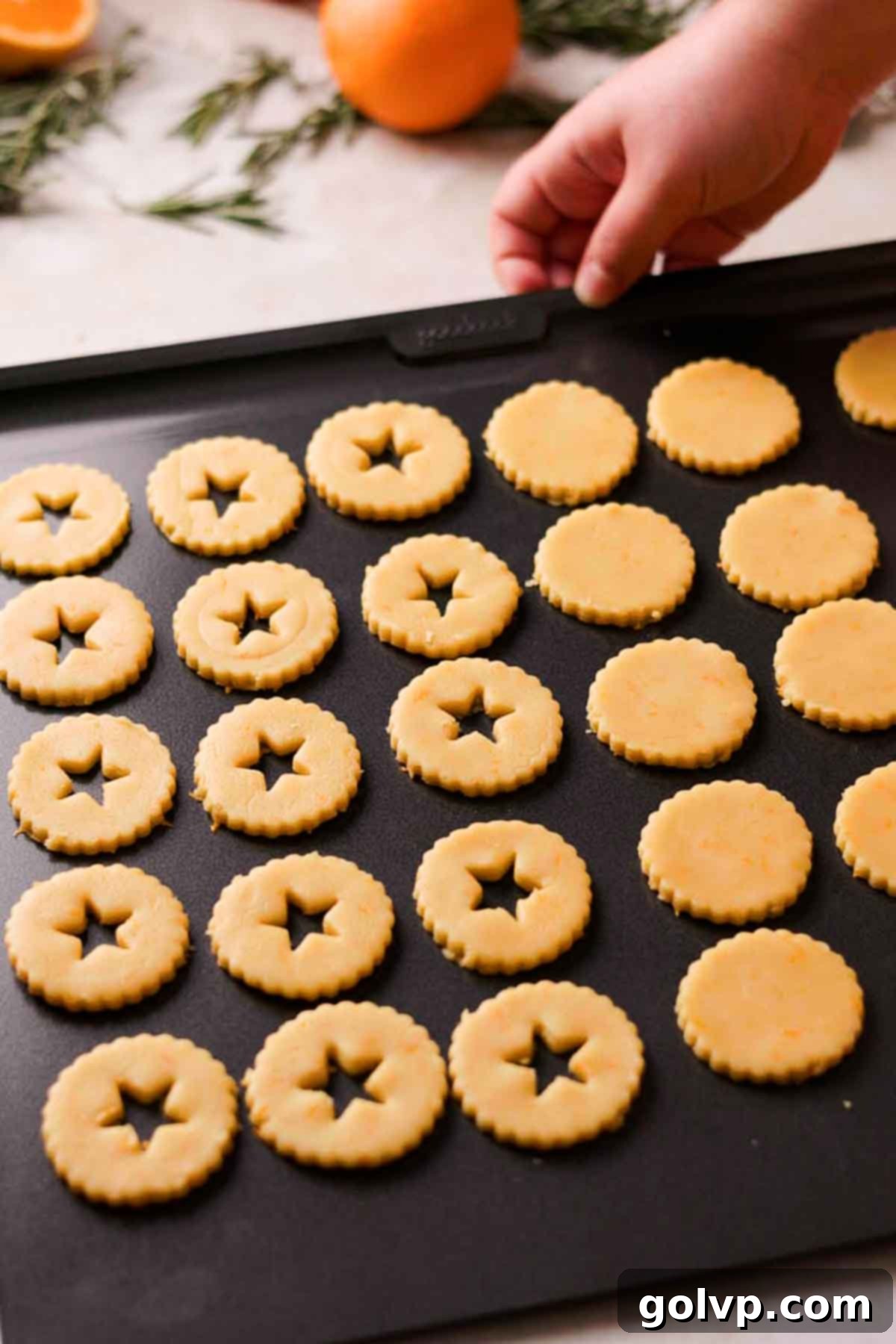 ready to bake orange shortbread cookies on a baking sheet