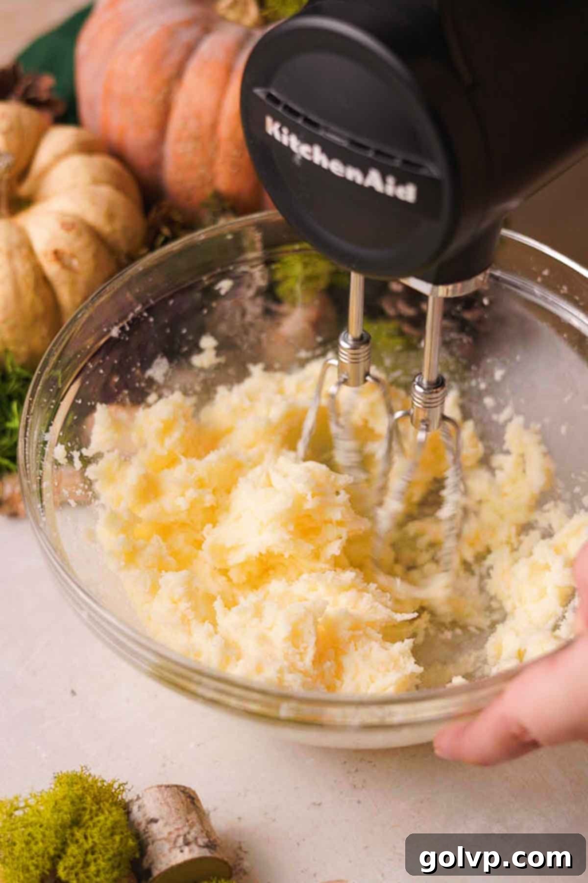 beating cold butter and sugar together for mushroom sugar cookies