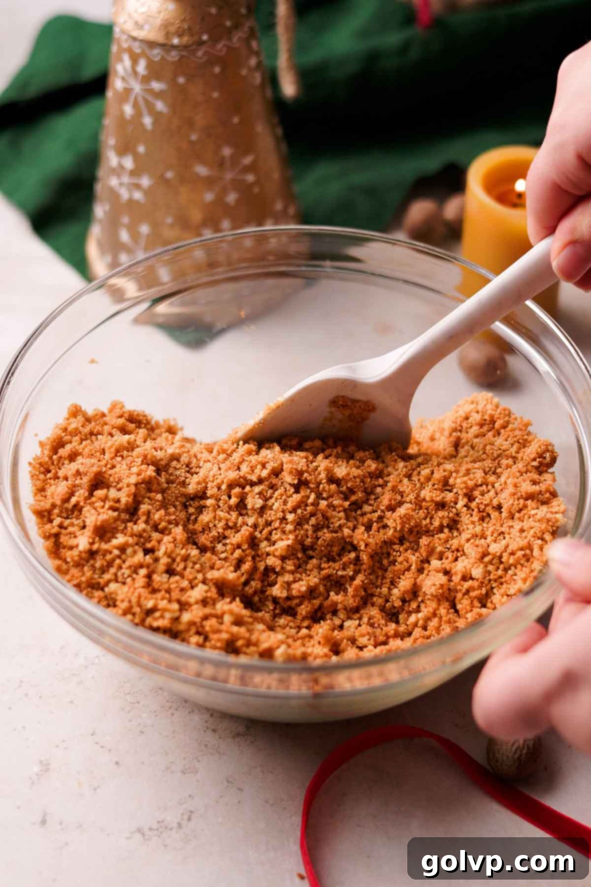 Decadent Holiday Eggnog Cheesecake 5 mixing gingersnap crust