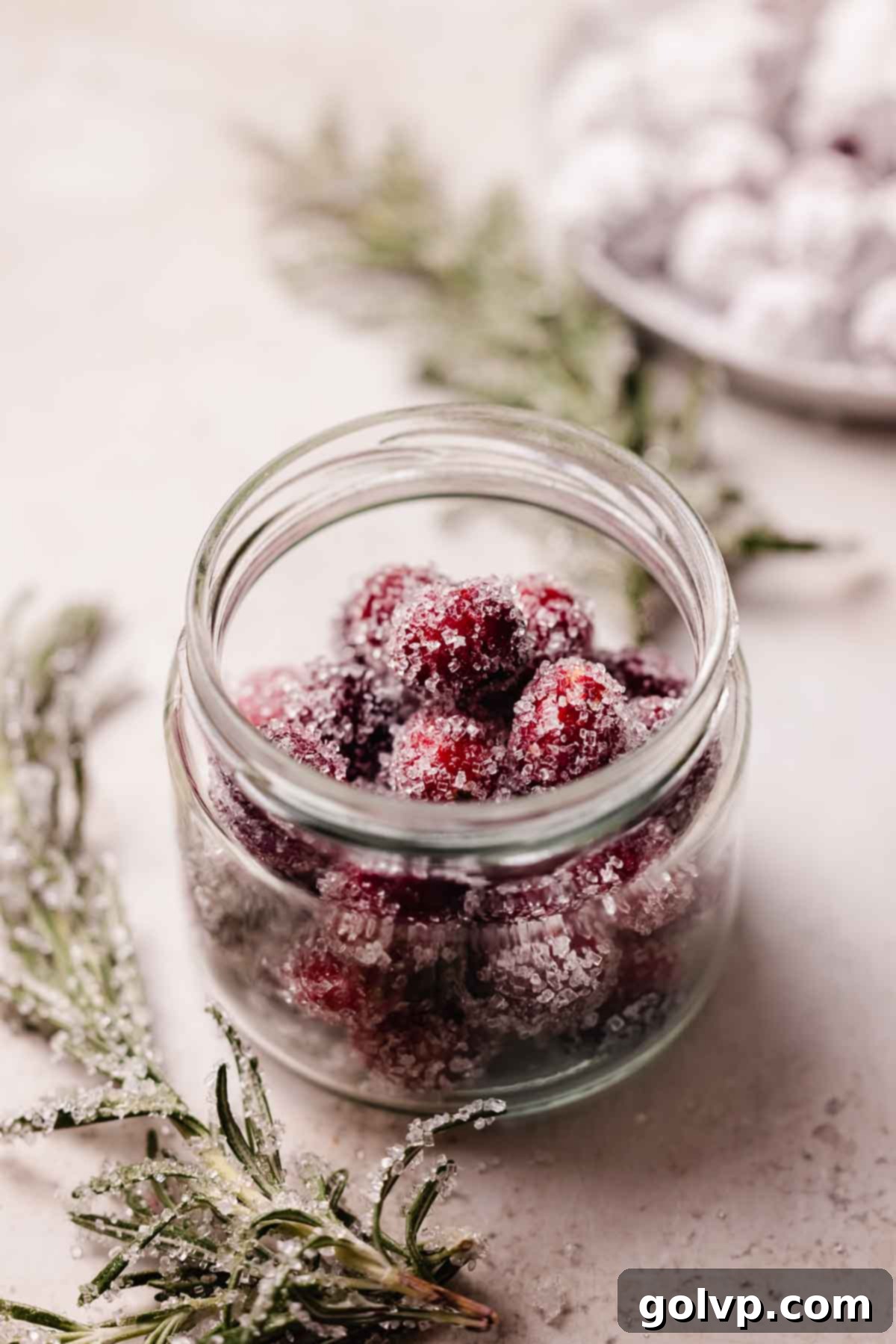 candied cranberries in a jar