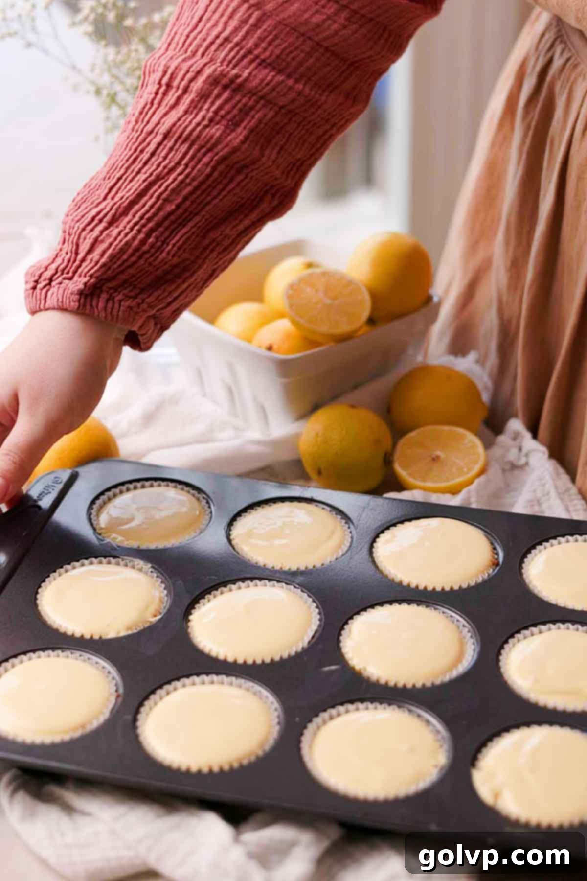 Sunshine Lemon Cheesecakes 11 cheesecake batter ready to bake in muffin tin