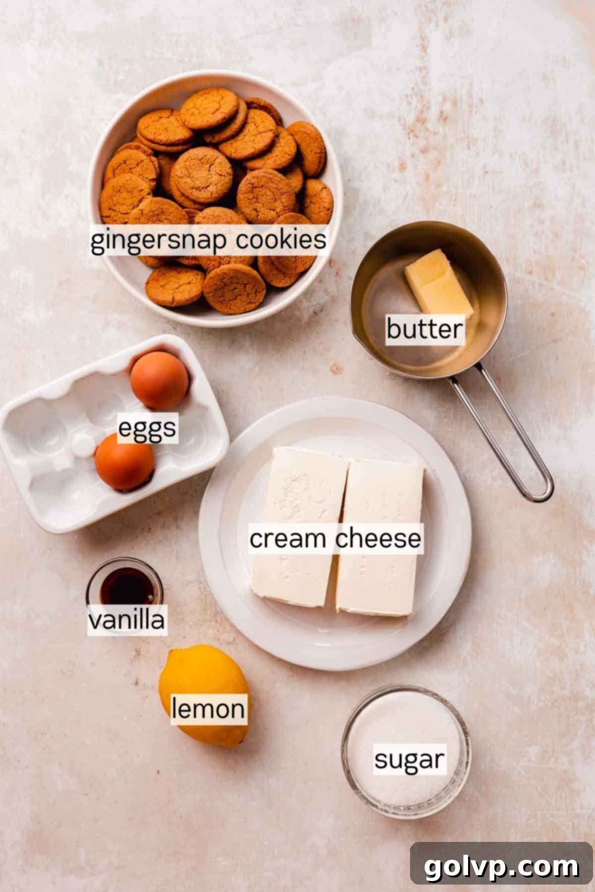 Sunshine Lemon Cheesecakes 4 assorted ingredients for mini lemon cheesecake on a white board