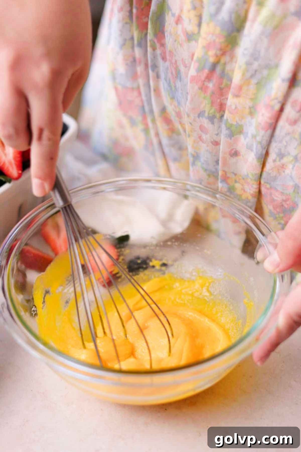 whisking yolks and sugar for creme brulee