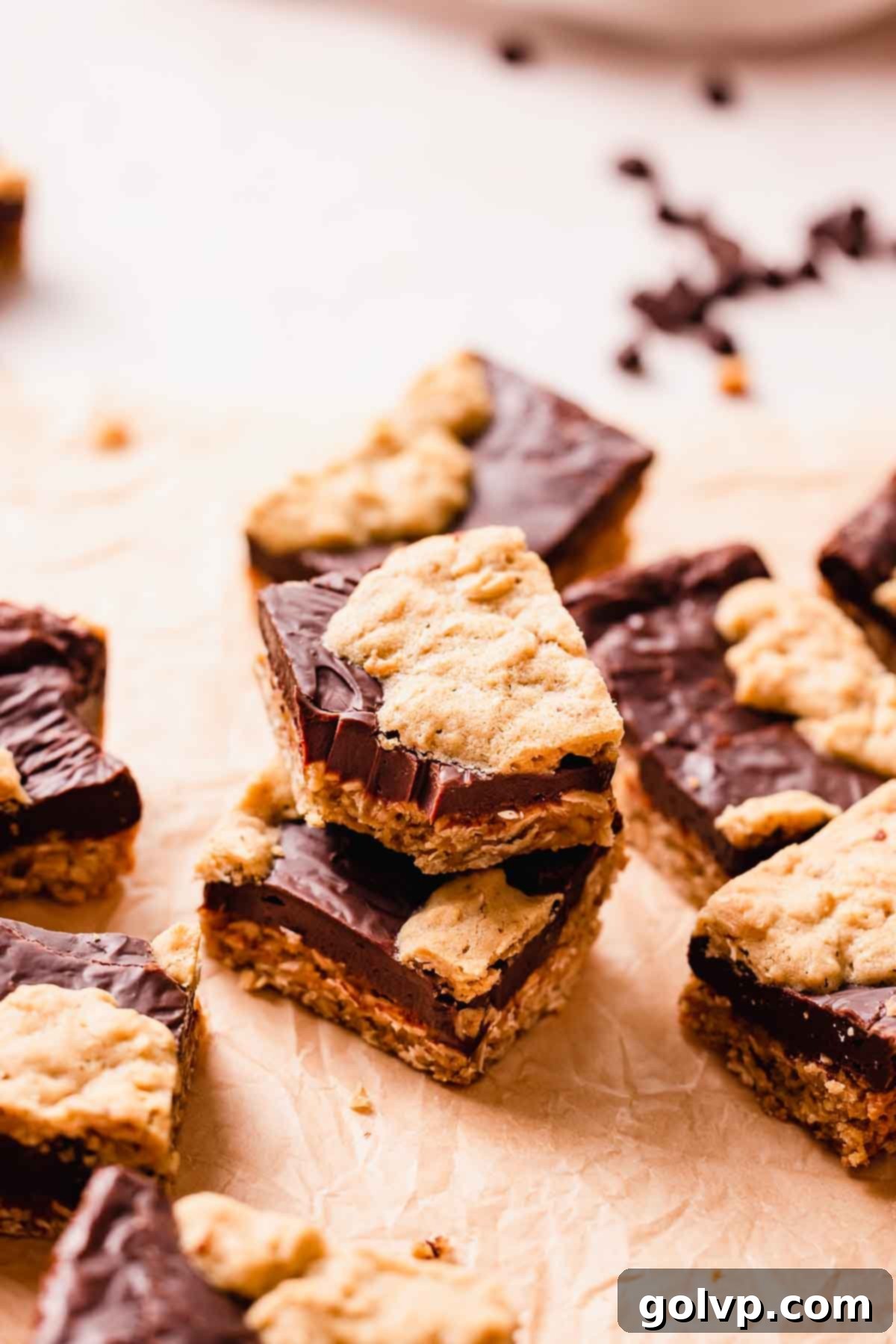 bitten oatmeal fudge bars on parchment paper