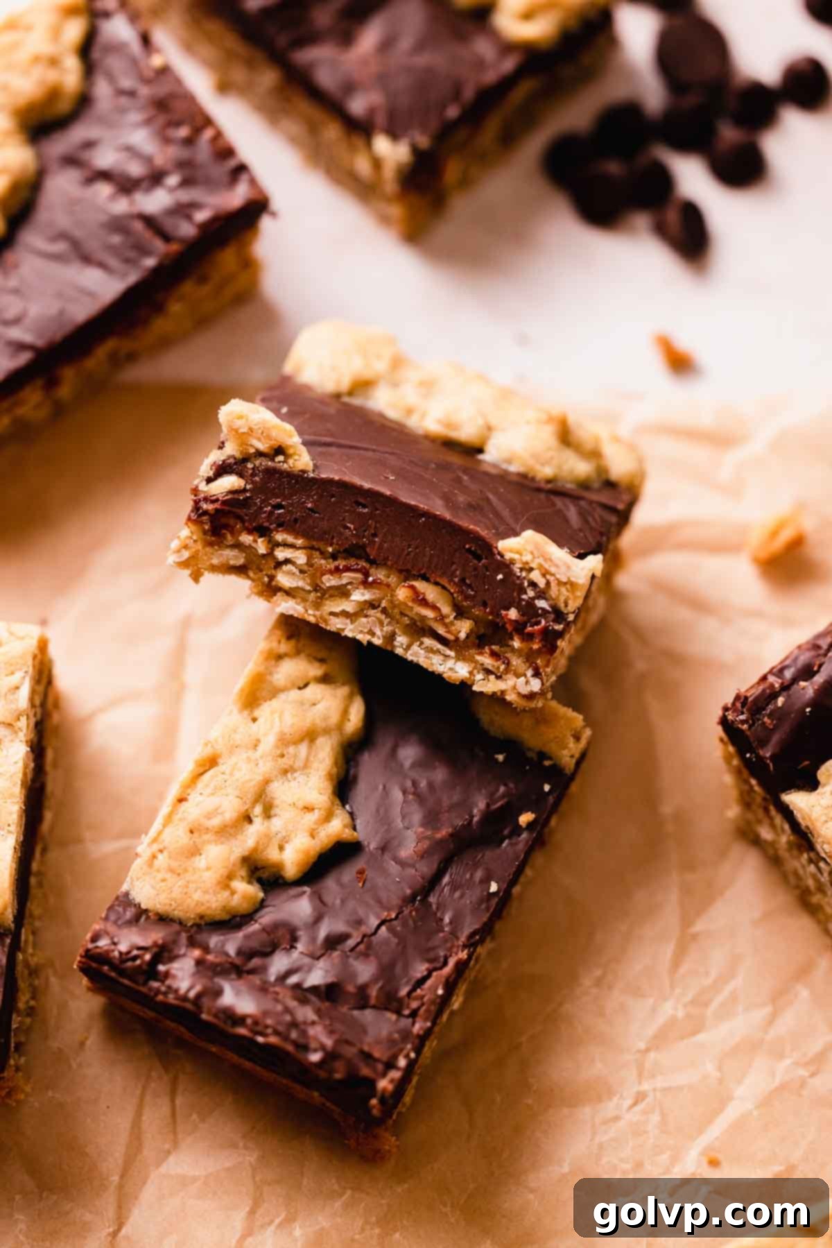 oatmeal fudge bar resting on top of another oatmeal fudge bar