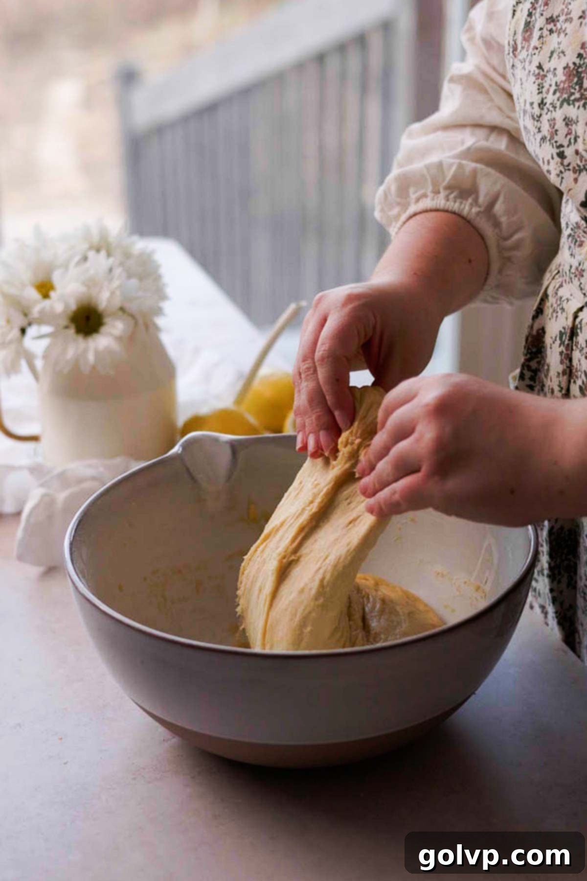 stretching and folding brioche dough the second time