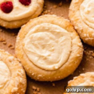 vatrushka with cottage cheese on parchment paper