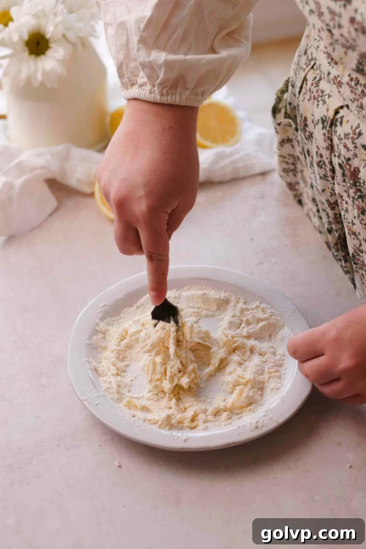mixing the streusel topping together with a fork