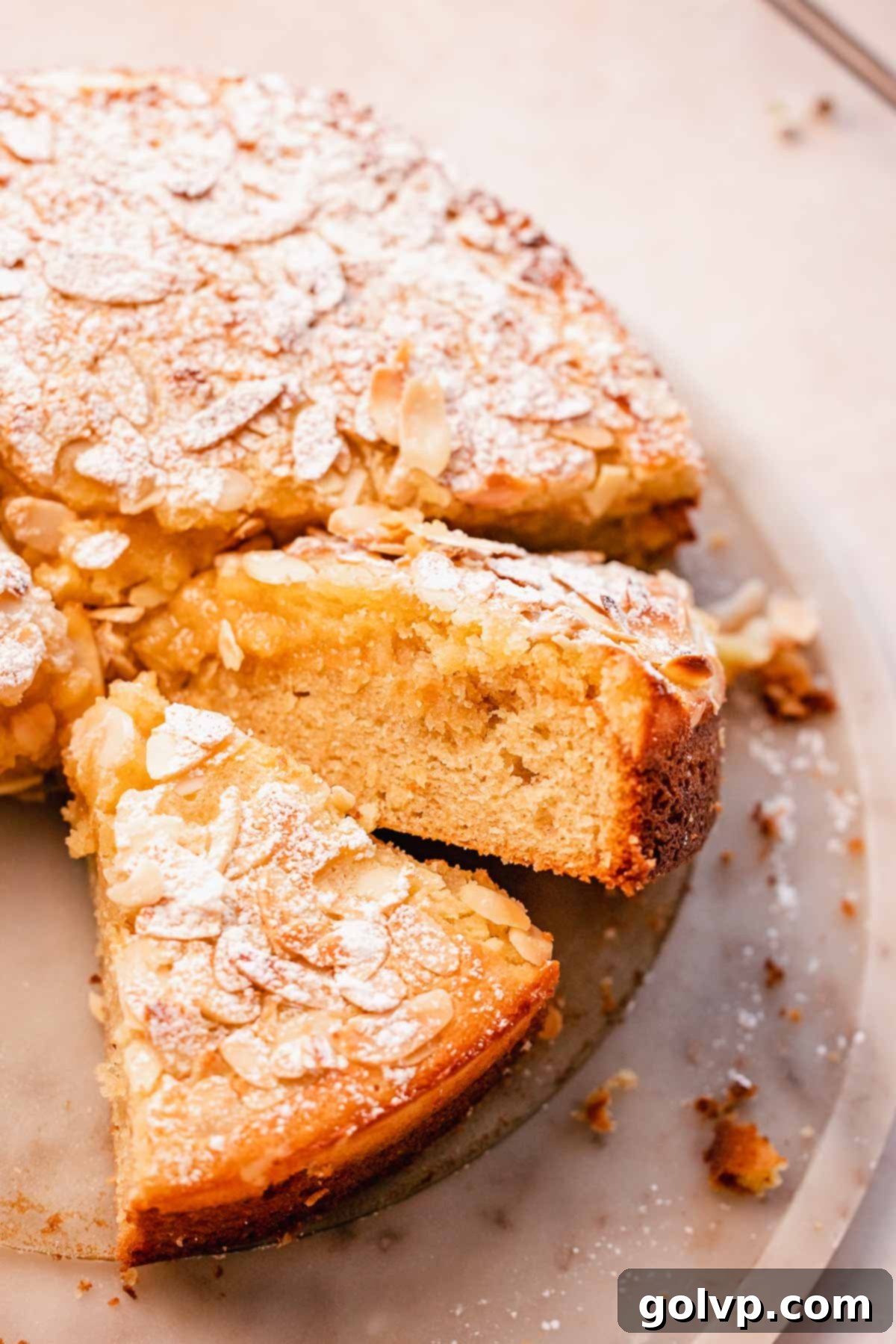 Double Almond Gooey Coffee Cake 2 sliced almond coffee cake with gooey almond topping