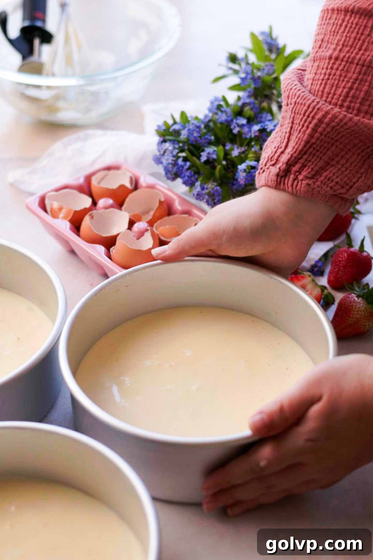 unbaked chiffon cake layer inside cake pan