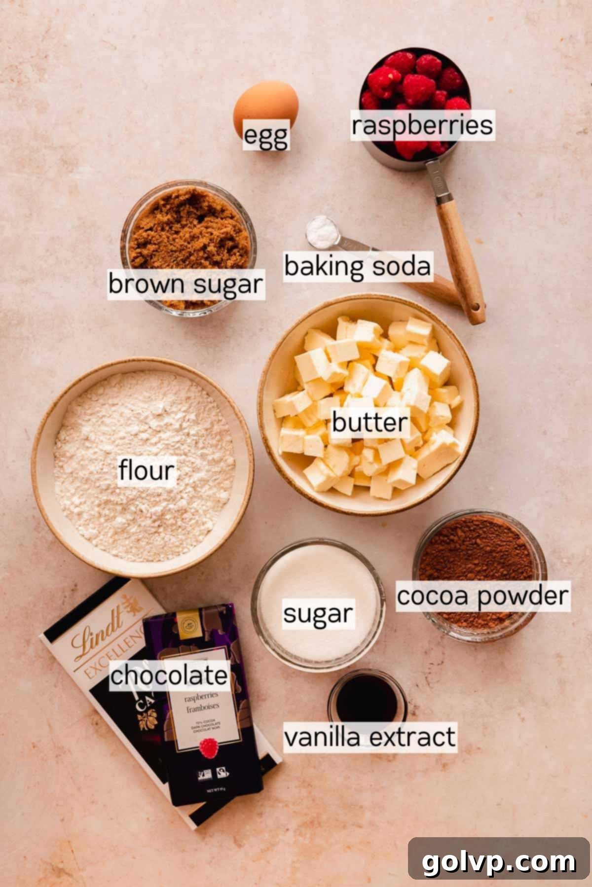 ingredients for chocolate raspberry cookies in bowls