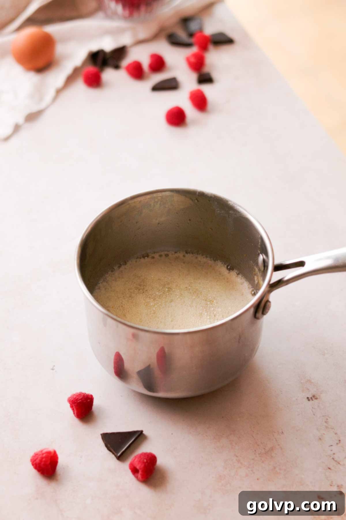 sizzling melted butter in a saucepan