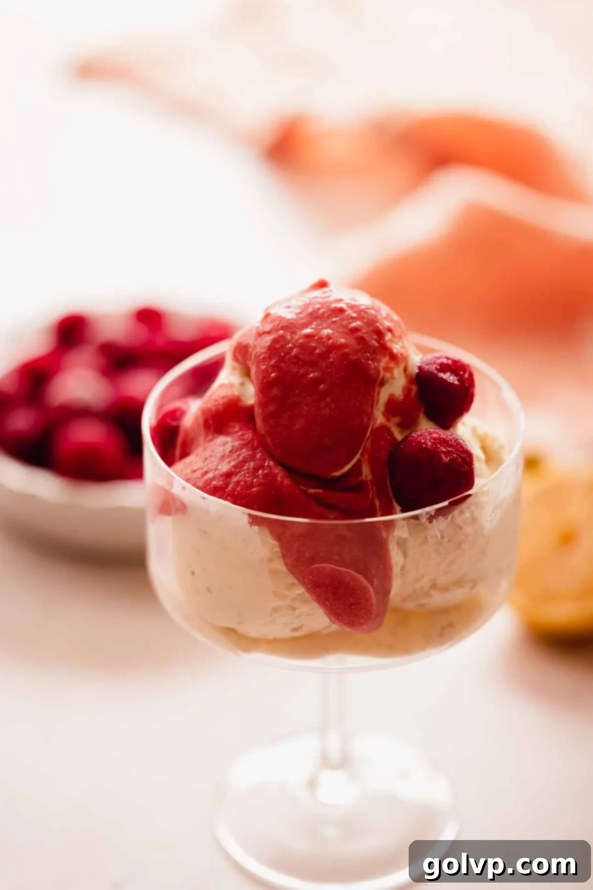 cherry curd topping over ice cream