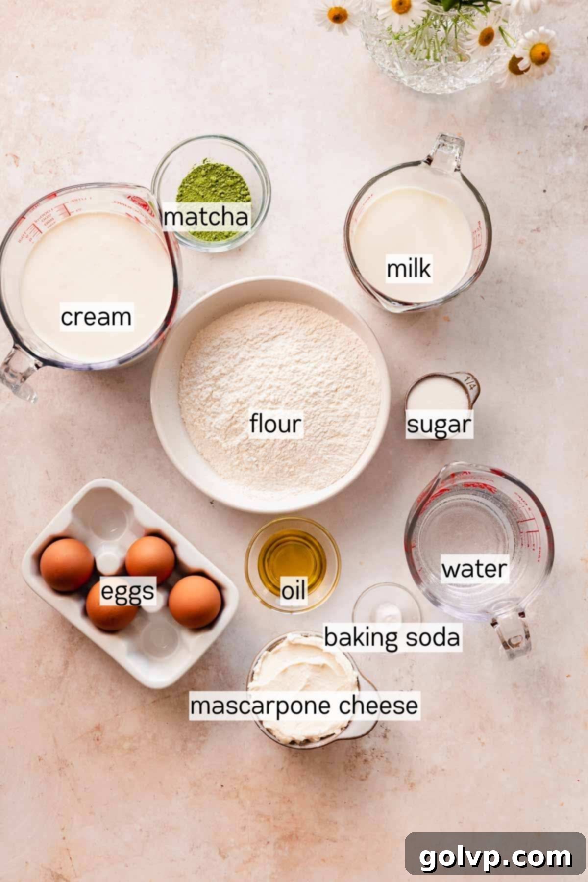 matcha crepe cake ingredients in small bowls and measuring cups