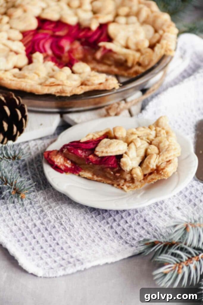 slice of apple pie with very flaky crust