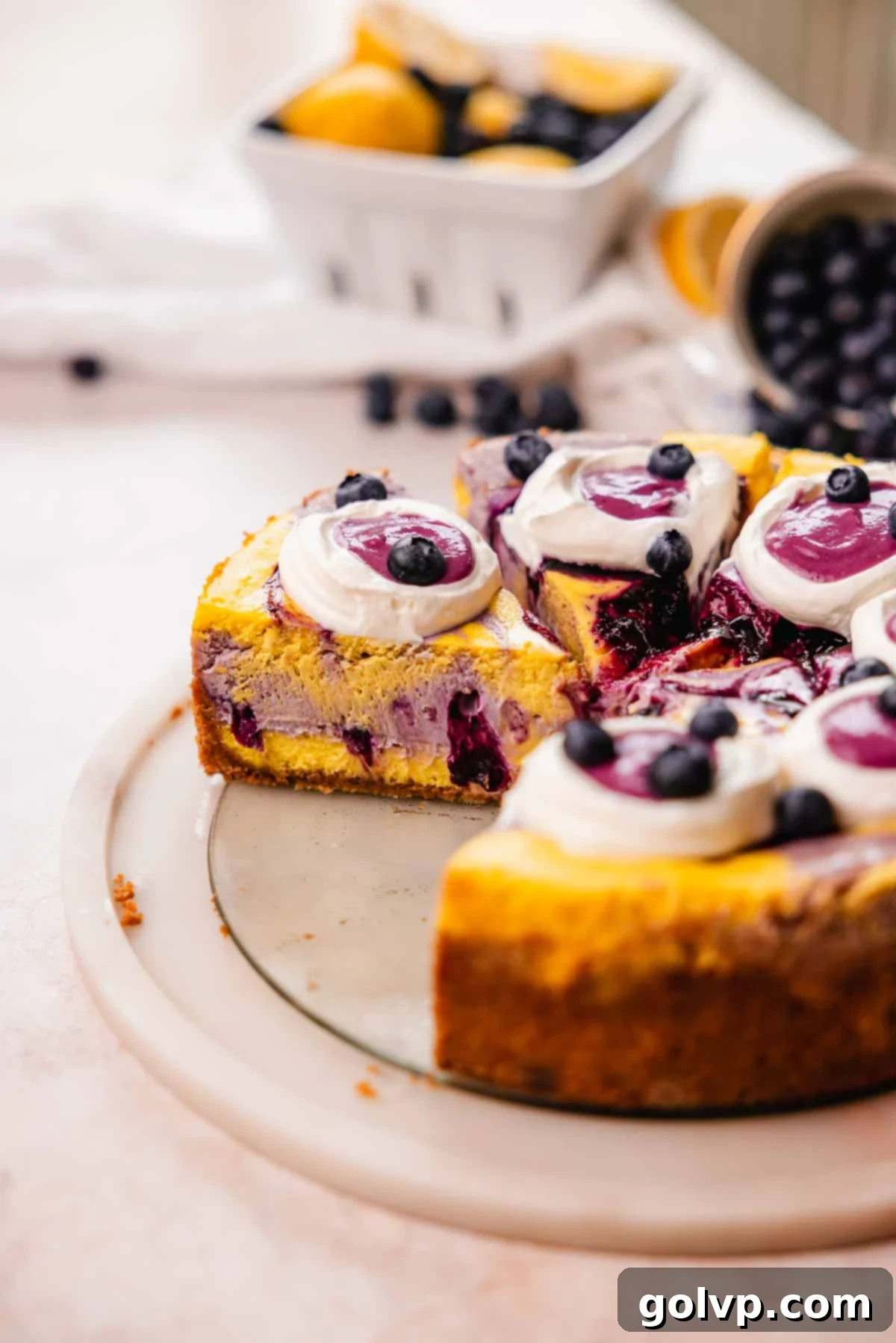 lemon blueberry cheesecake slices with inside swirl layers