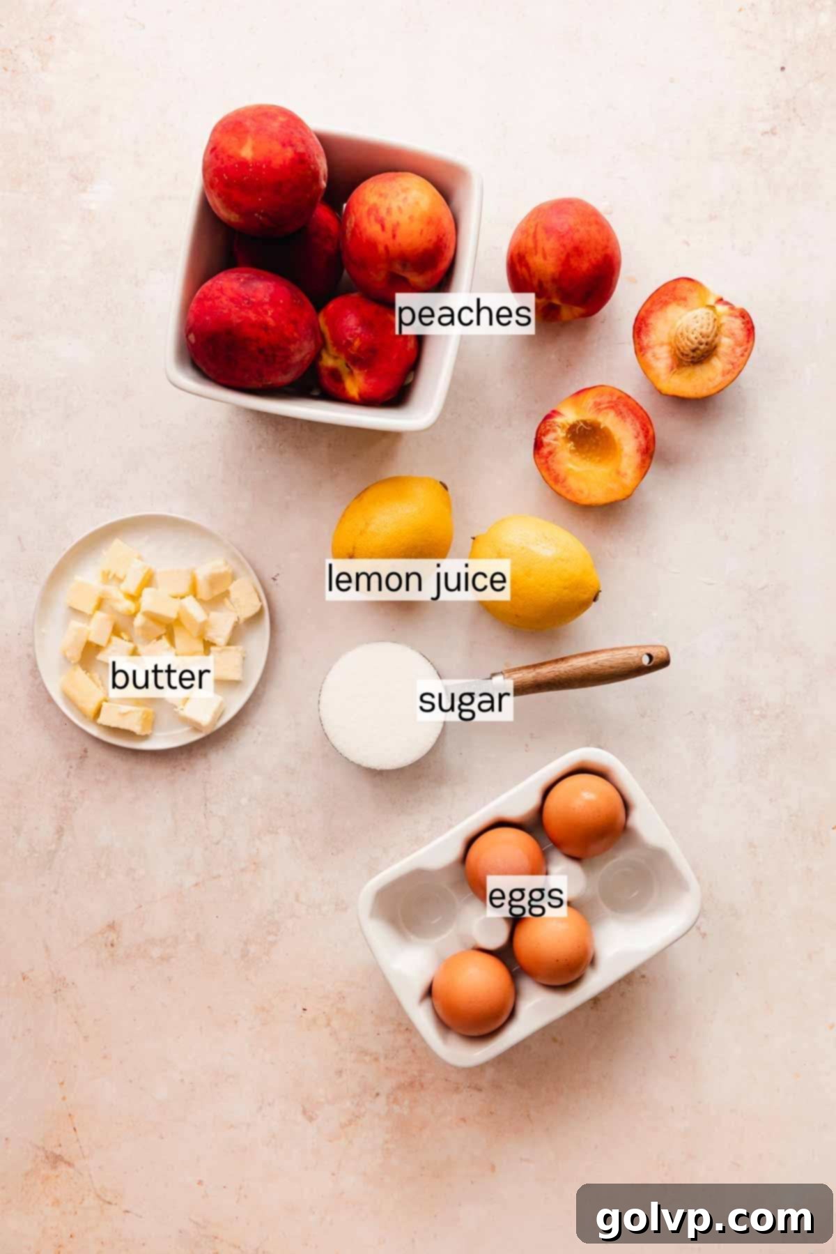 Various peach curd ingredients arranged on ceramic plates and bowls on a kitchen counter
